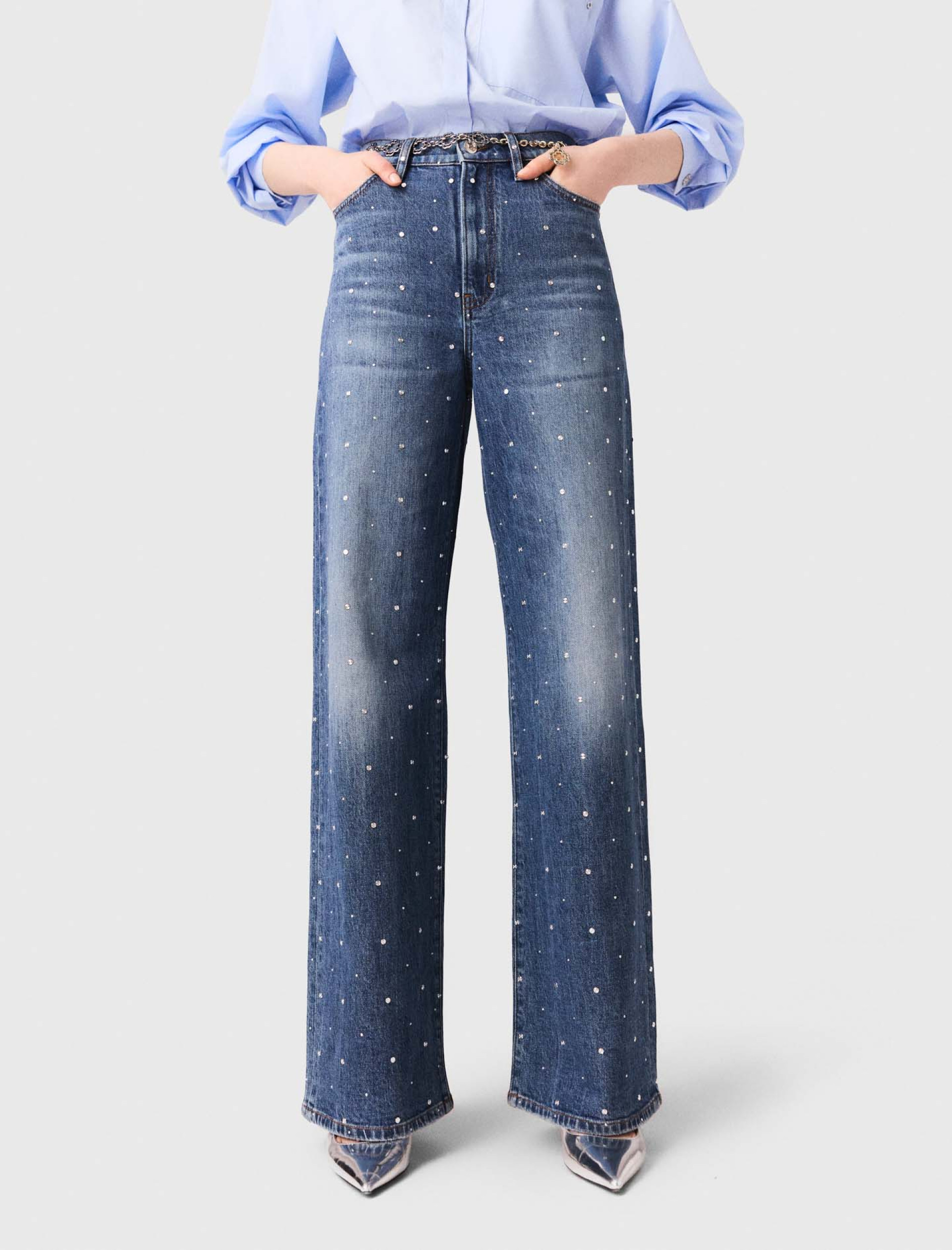 Жіночі широкі джинси з заклепками