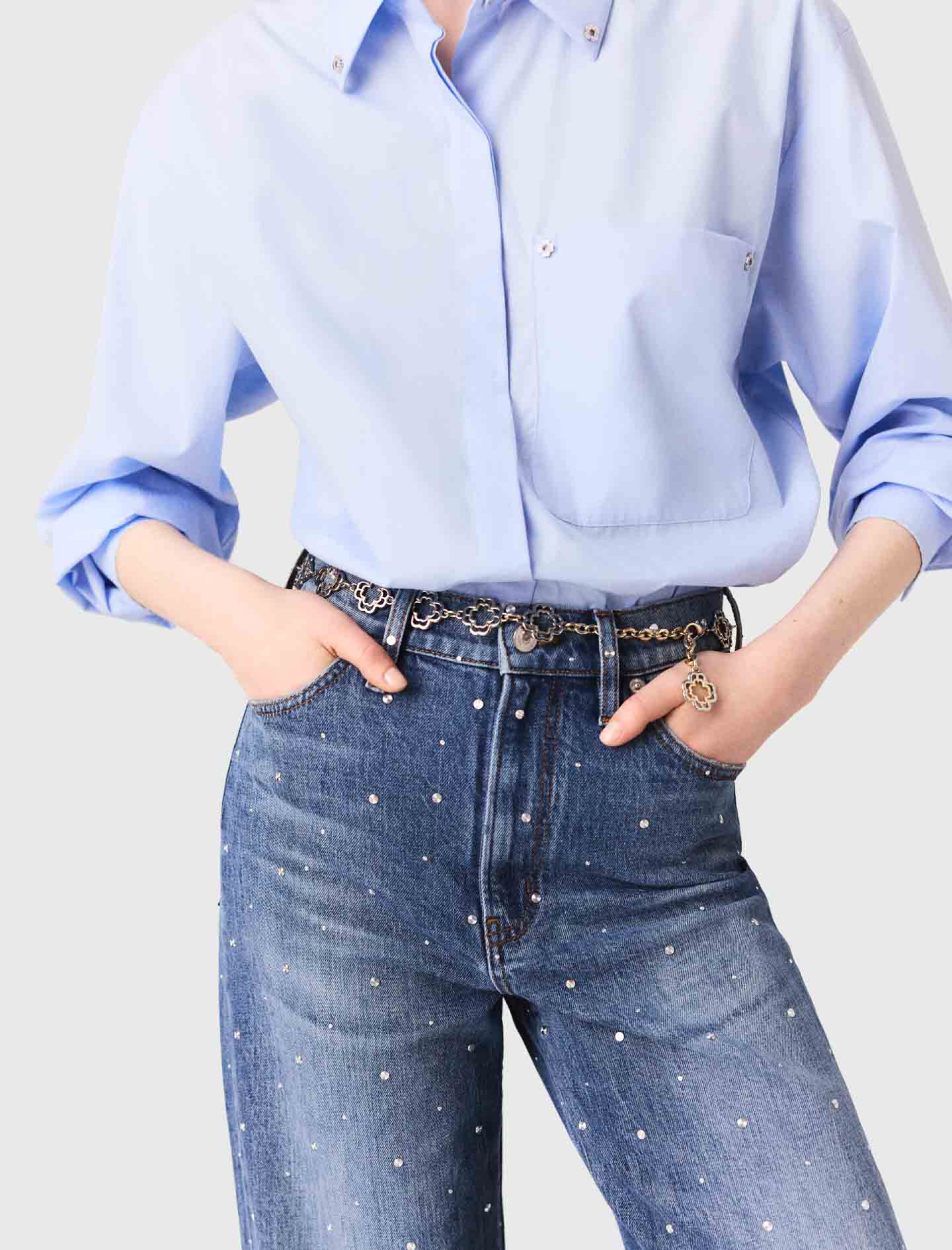 Жіночі широкі джинси з заклепками