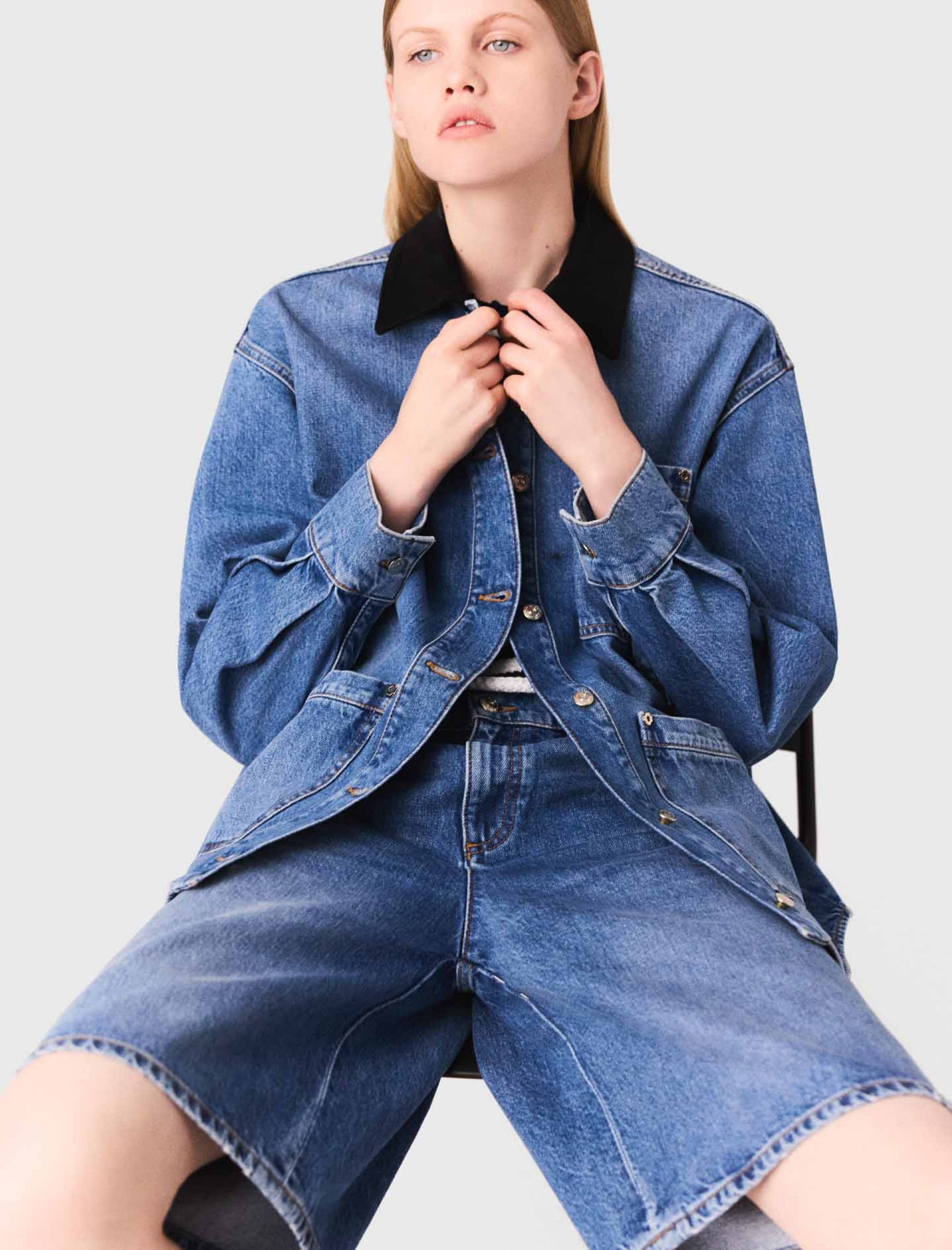 Жіноча джинсова куртка з контрастним коміром