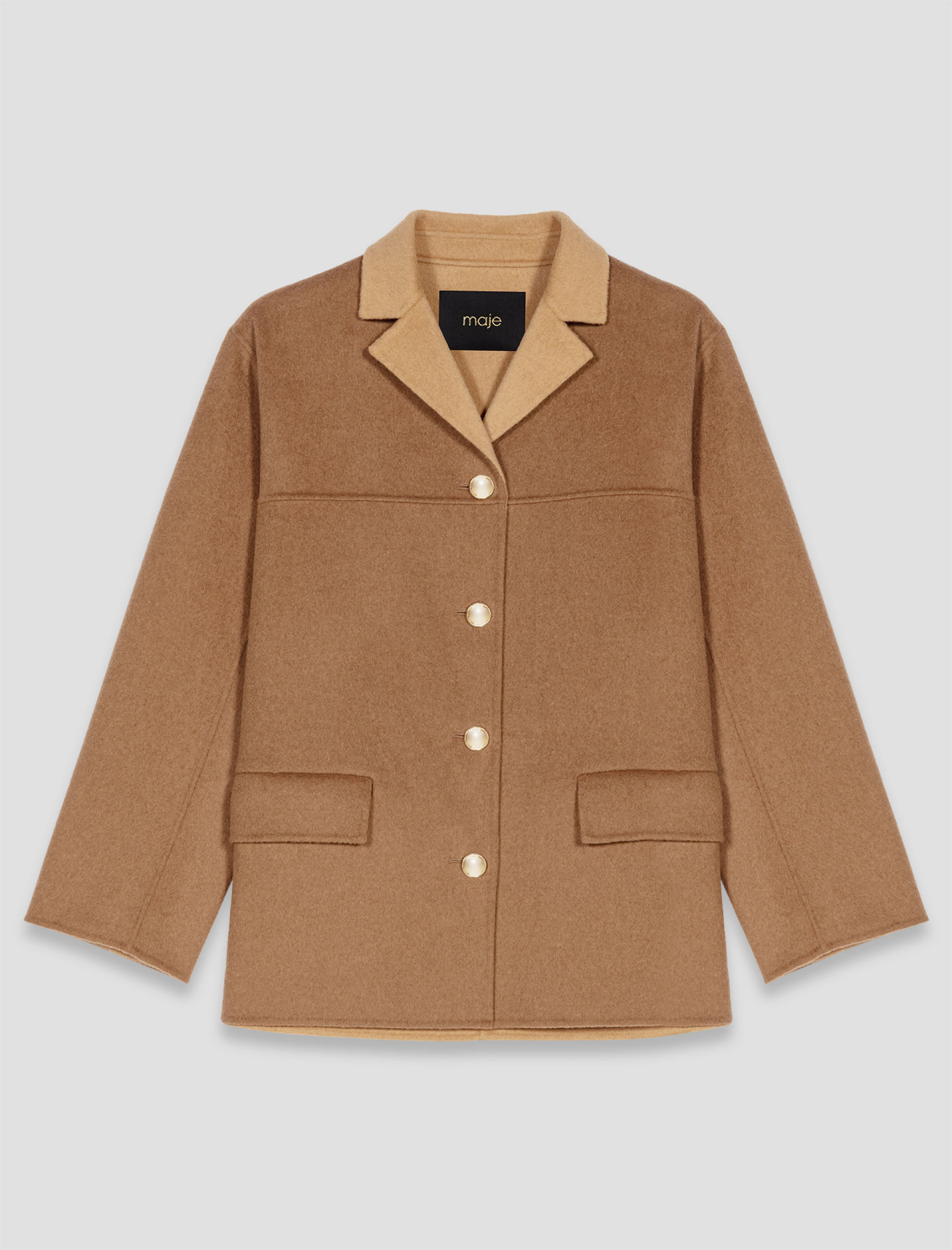 Жіноче коротке вовняне пальто