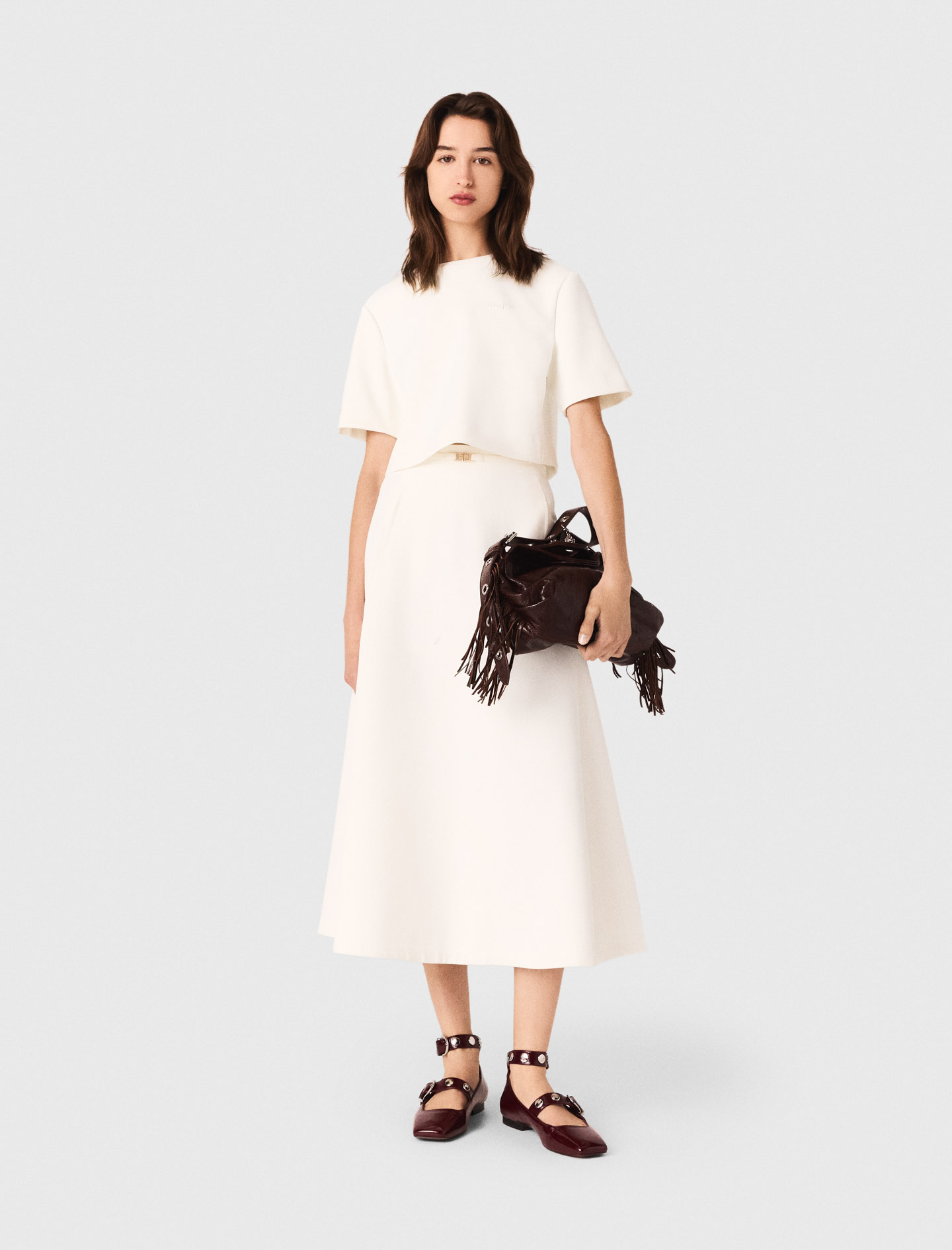 Женский белый топ из плотного крепа