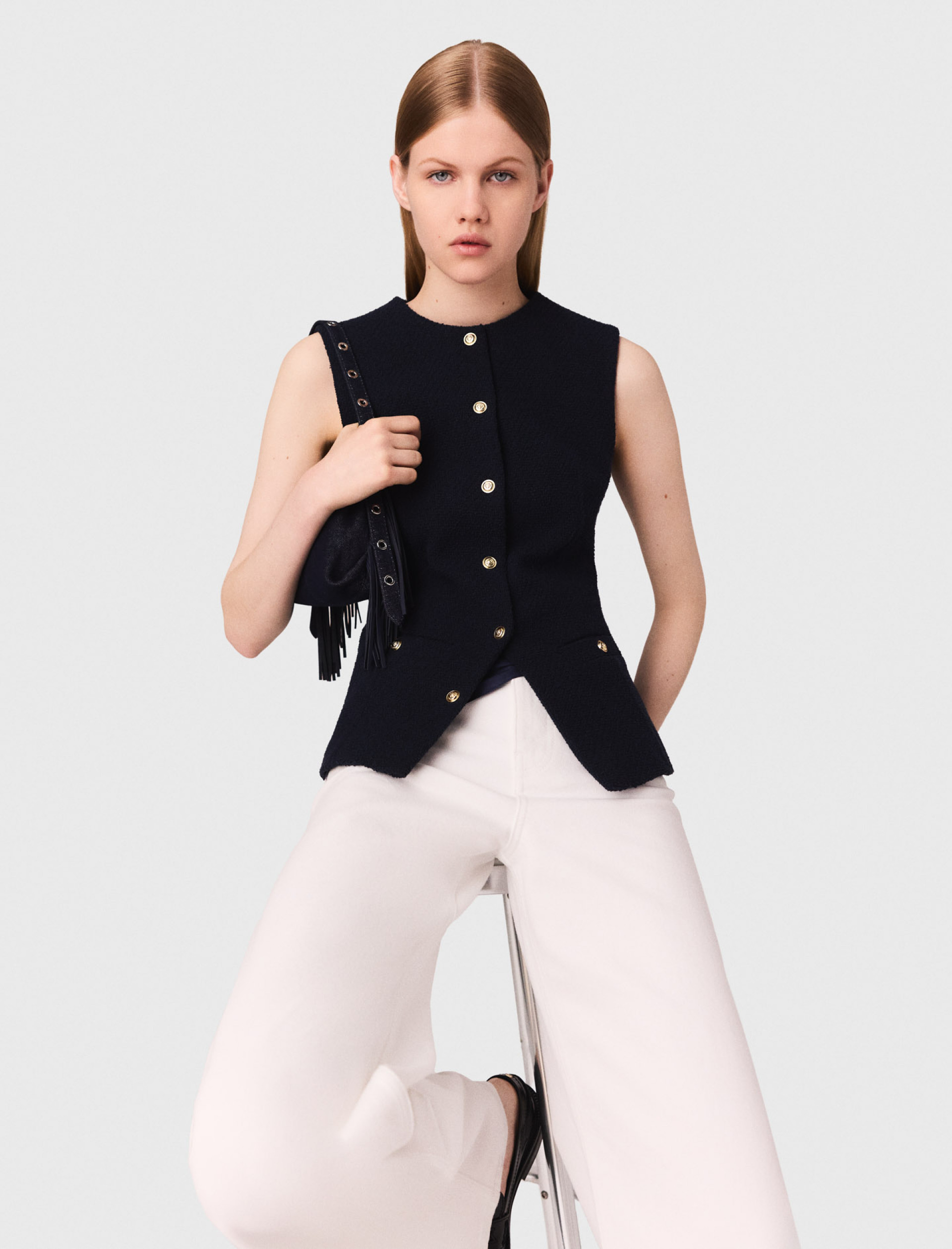 Жіночий довгий твідовий жилет