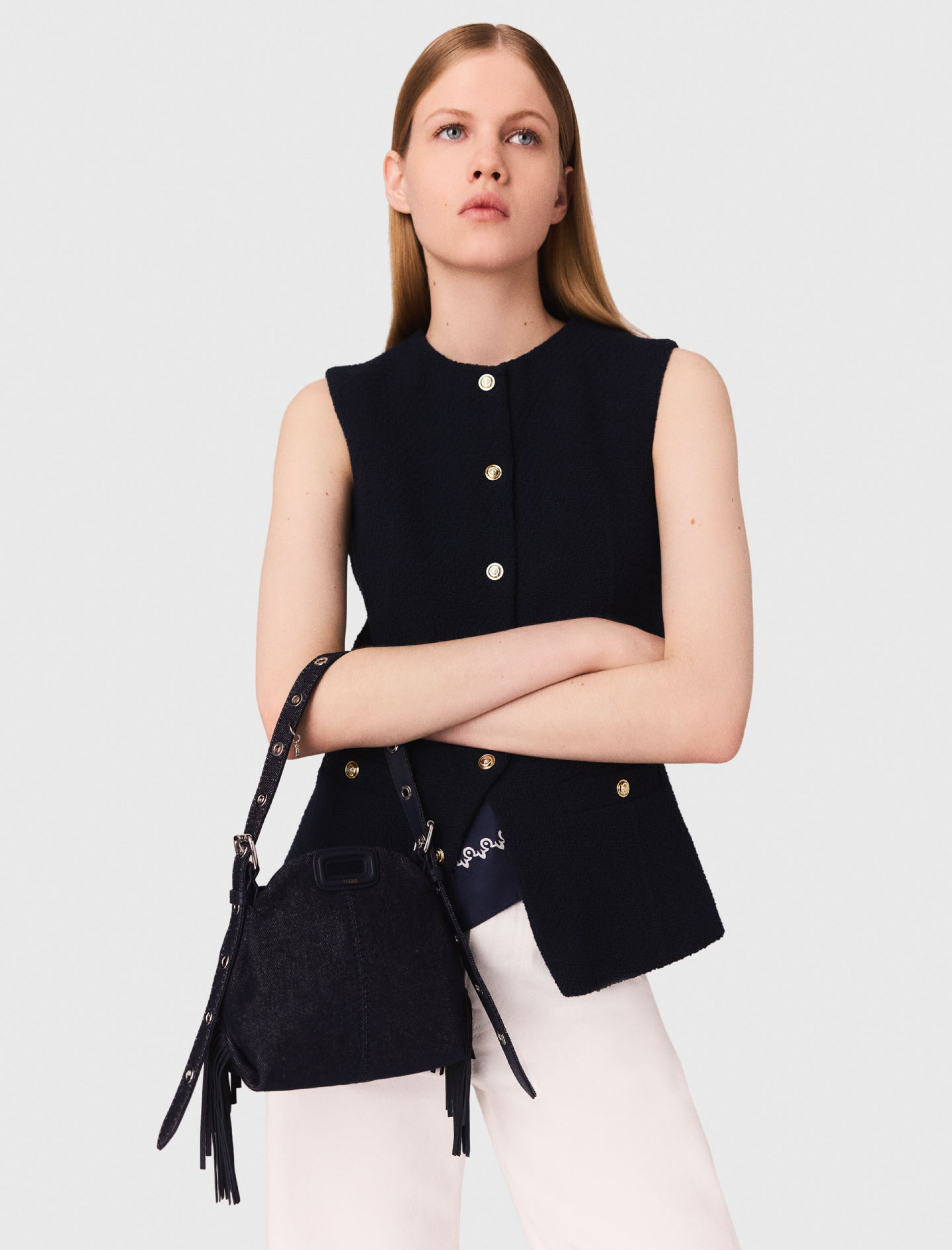 Жіночий довгий твідовий жилет