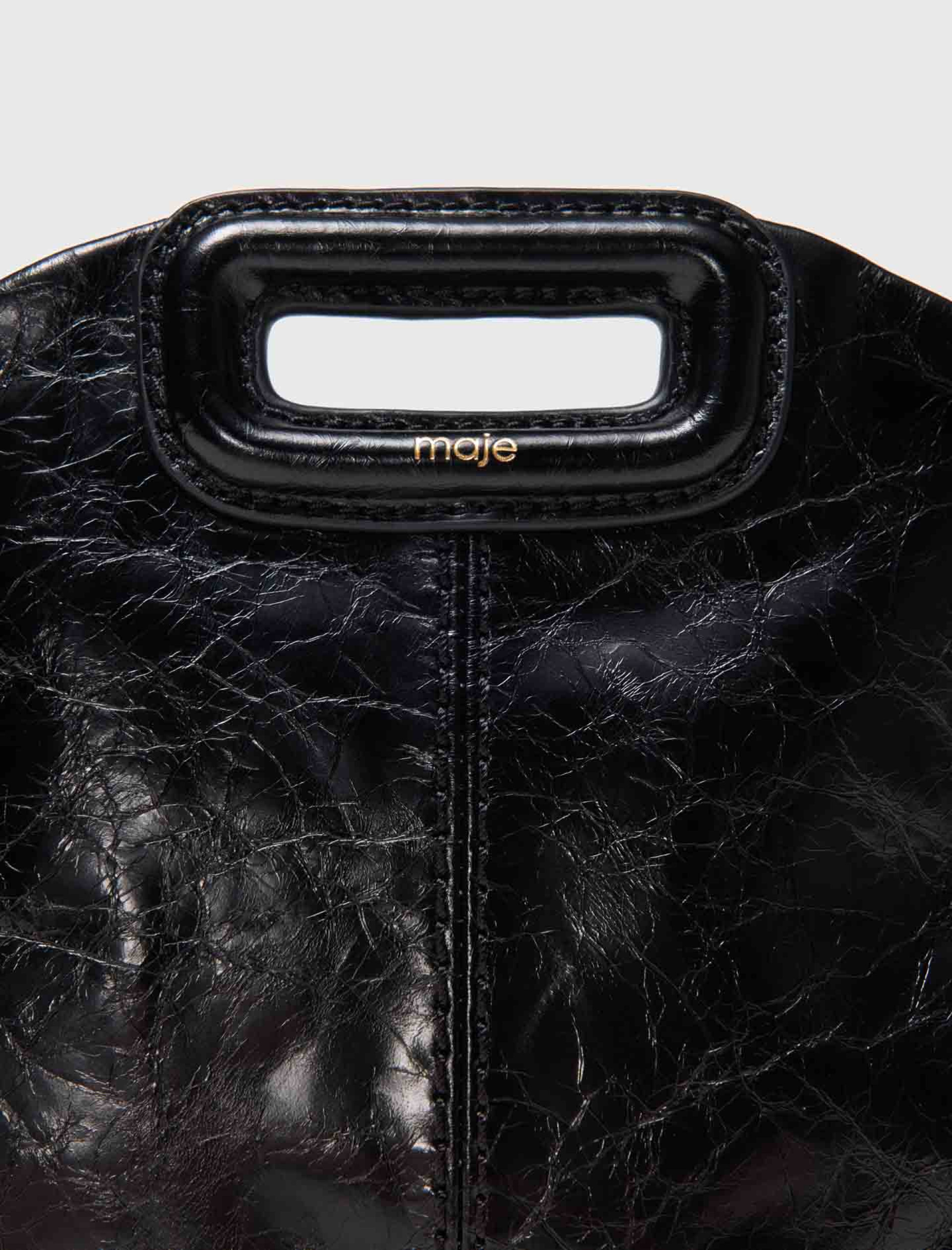 Жіноча міні-сумка Miss M з лакованої шкіри