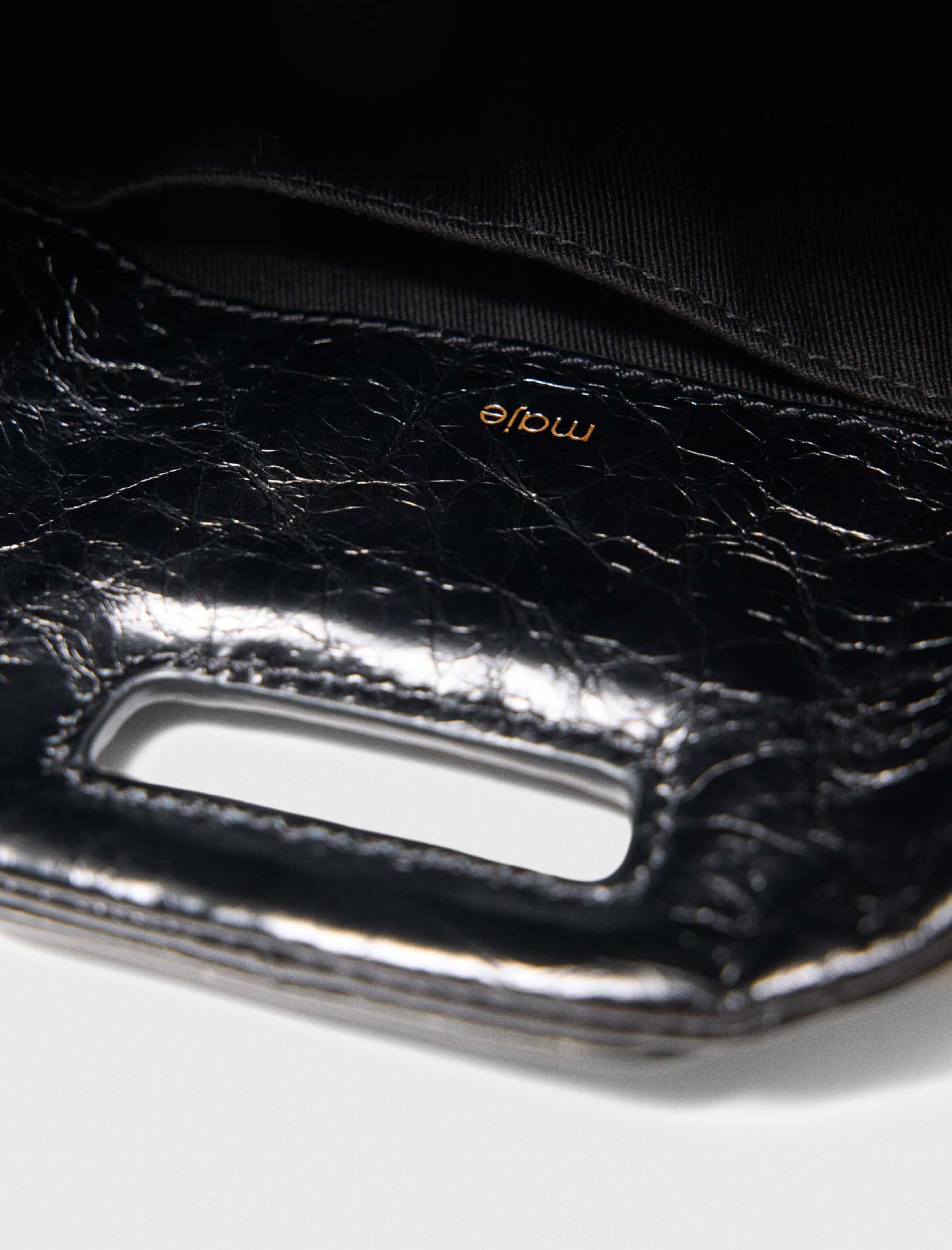 Жіноча міні-сумка Miss M з лакованої шкіри