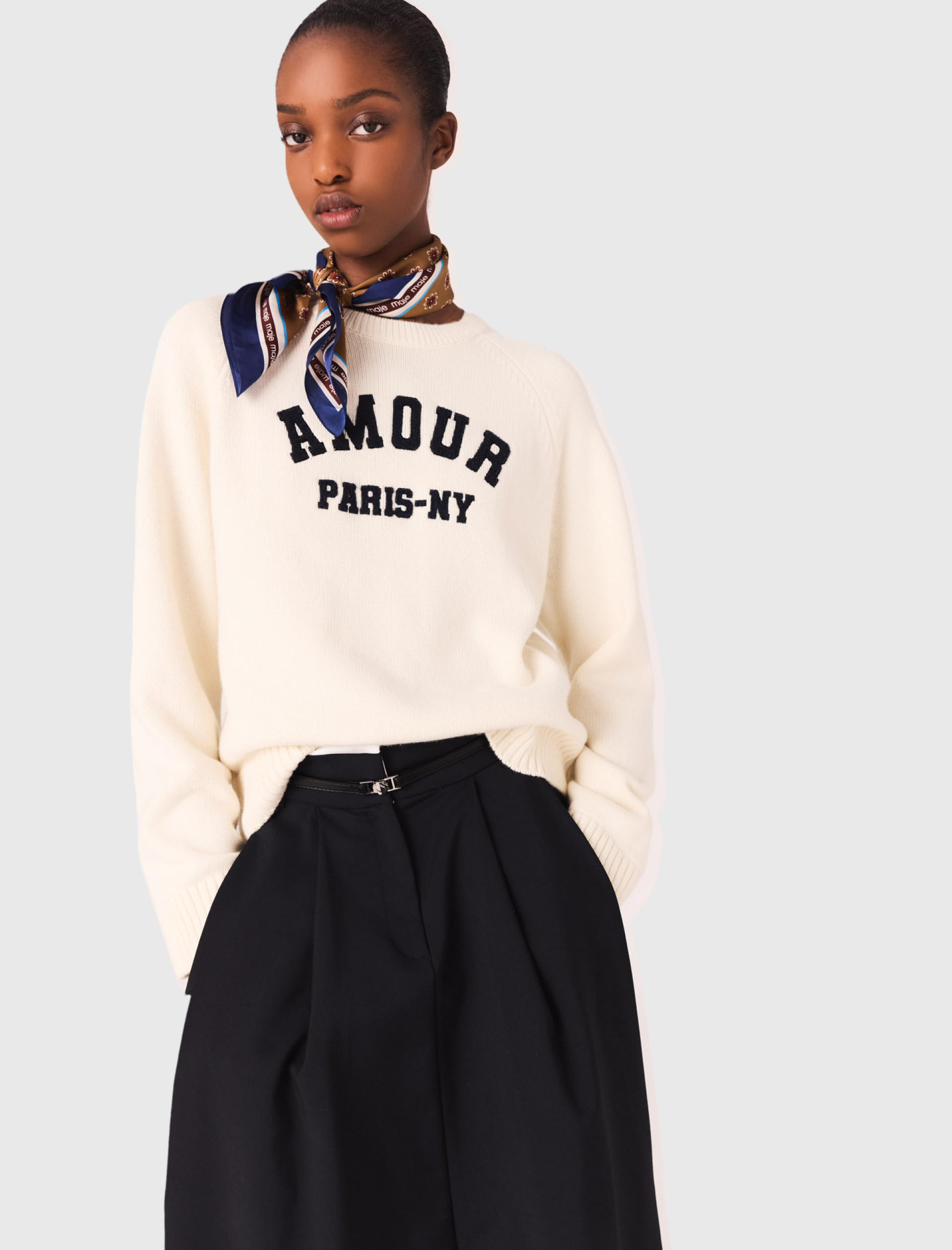 Жіночий молочний вовняний светр