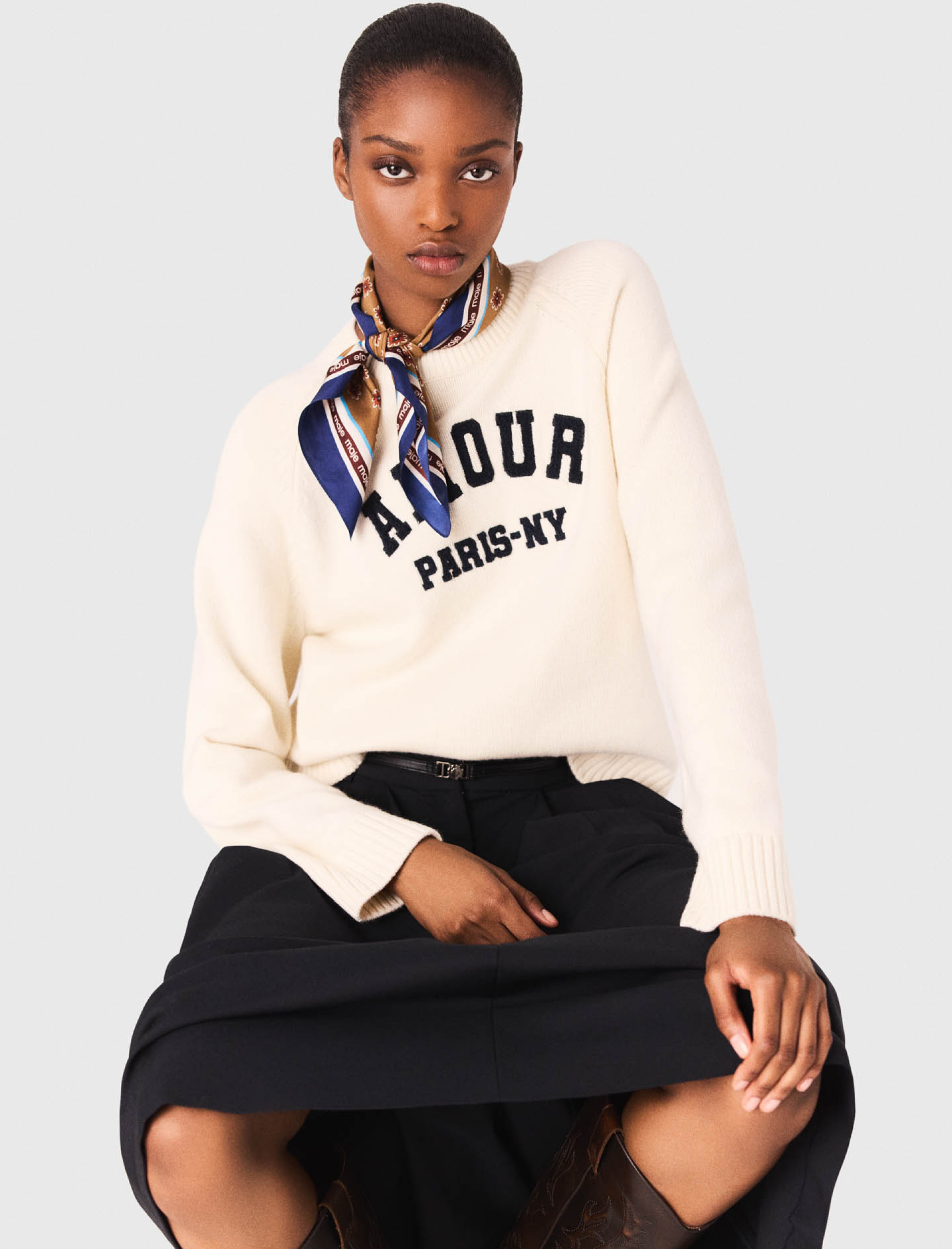 Жіночий молочний вовняний светр