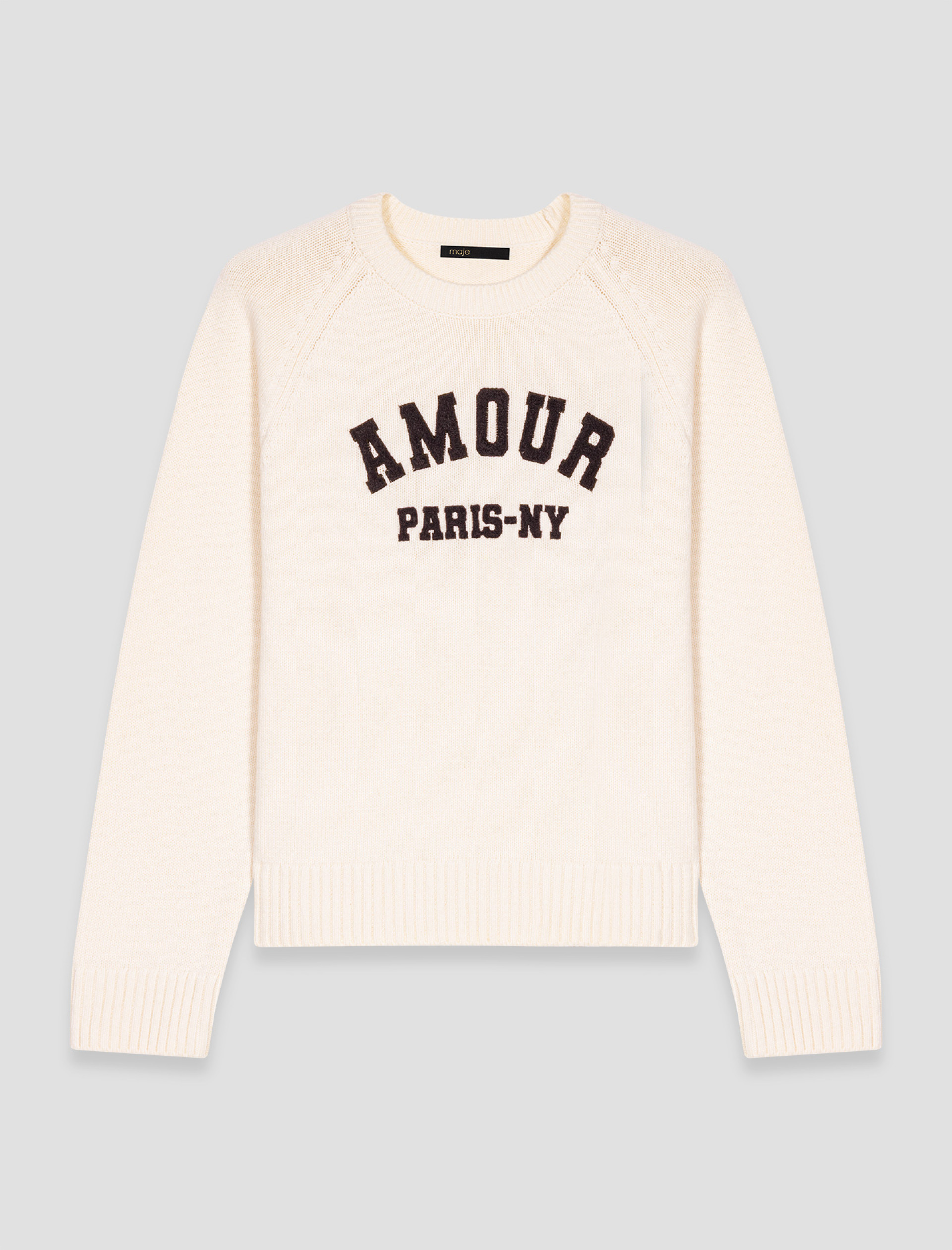 Жіночий молочний вовняний светр