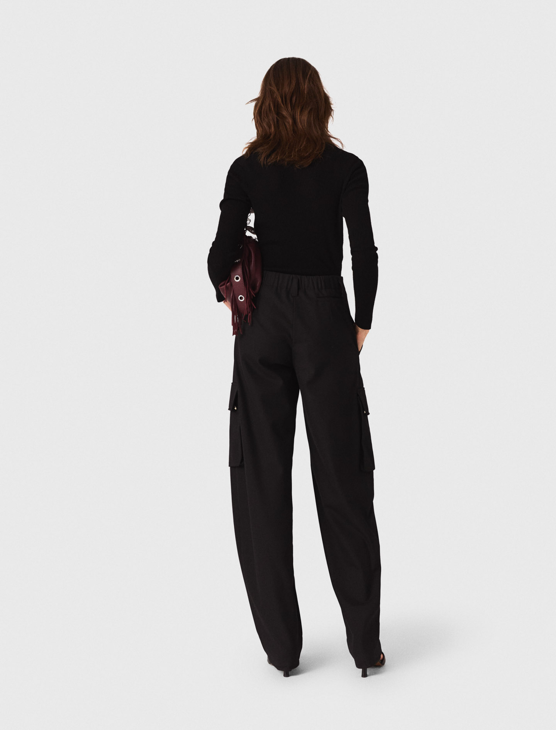 Женский черный гольф в рубчик