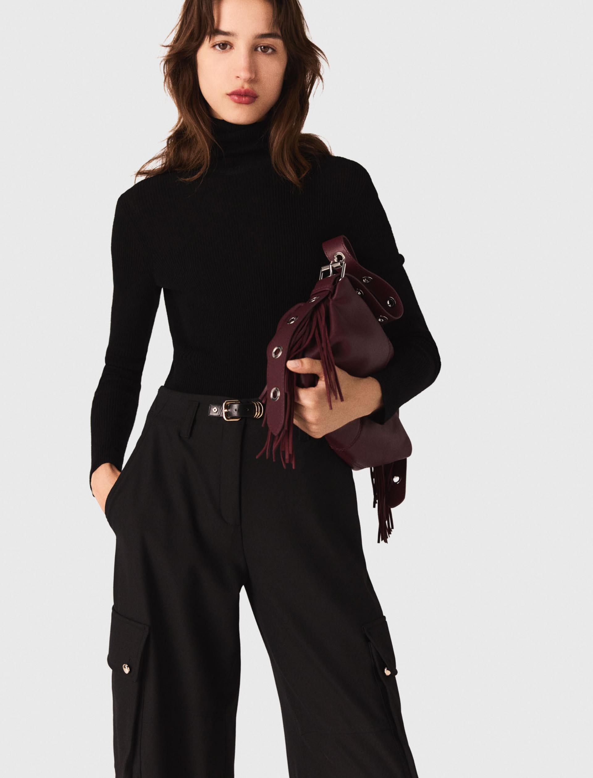 Женский черный гольф в рубчик