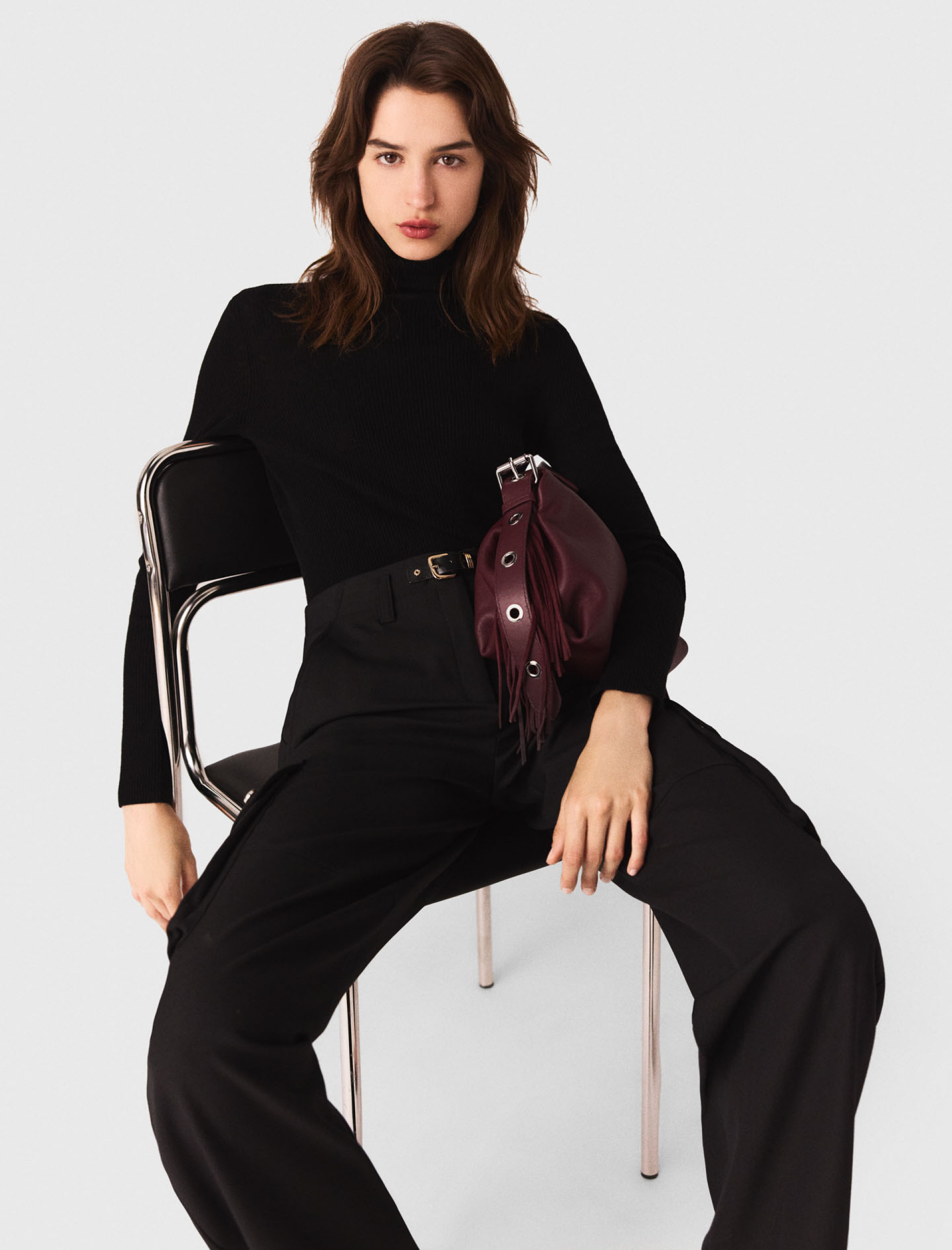 Женский черный гольф в рубчик