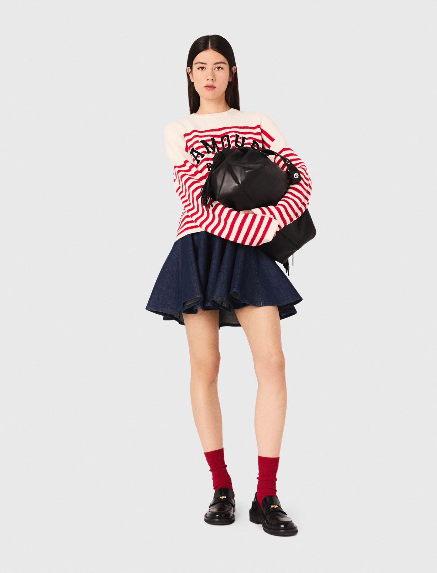 Жіночий смугастий светр в рубчик