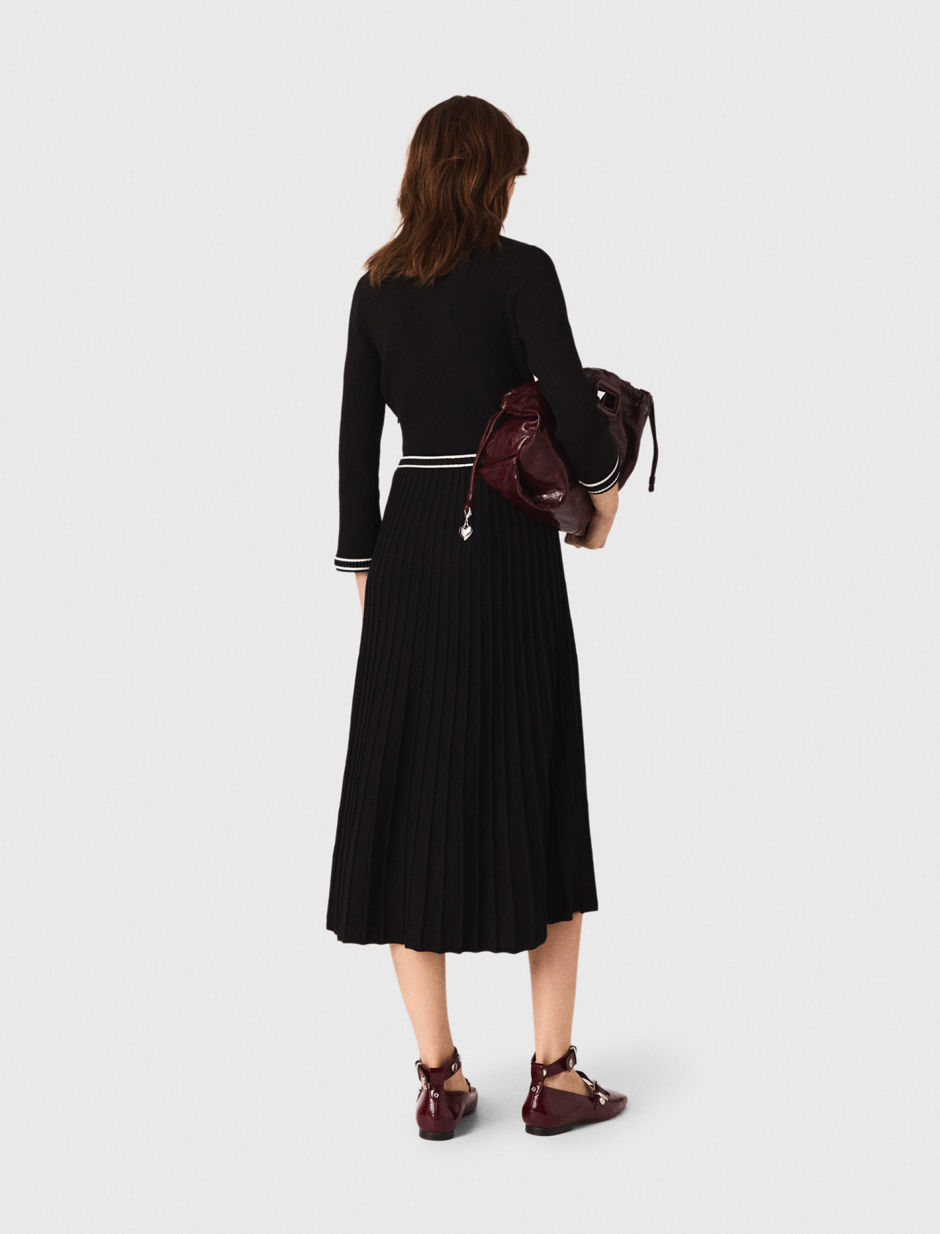 Жіноча трикотажна сукня міді Жіноча трикотажна сукня міді