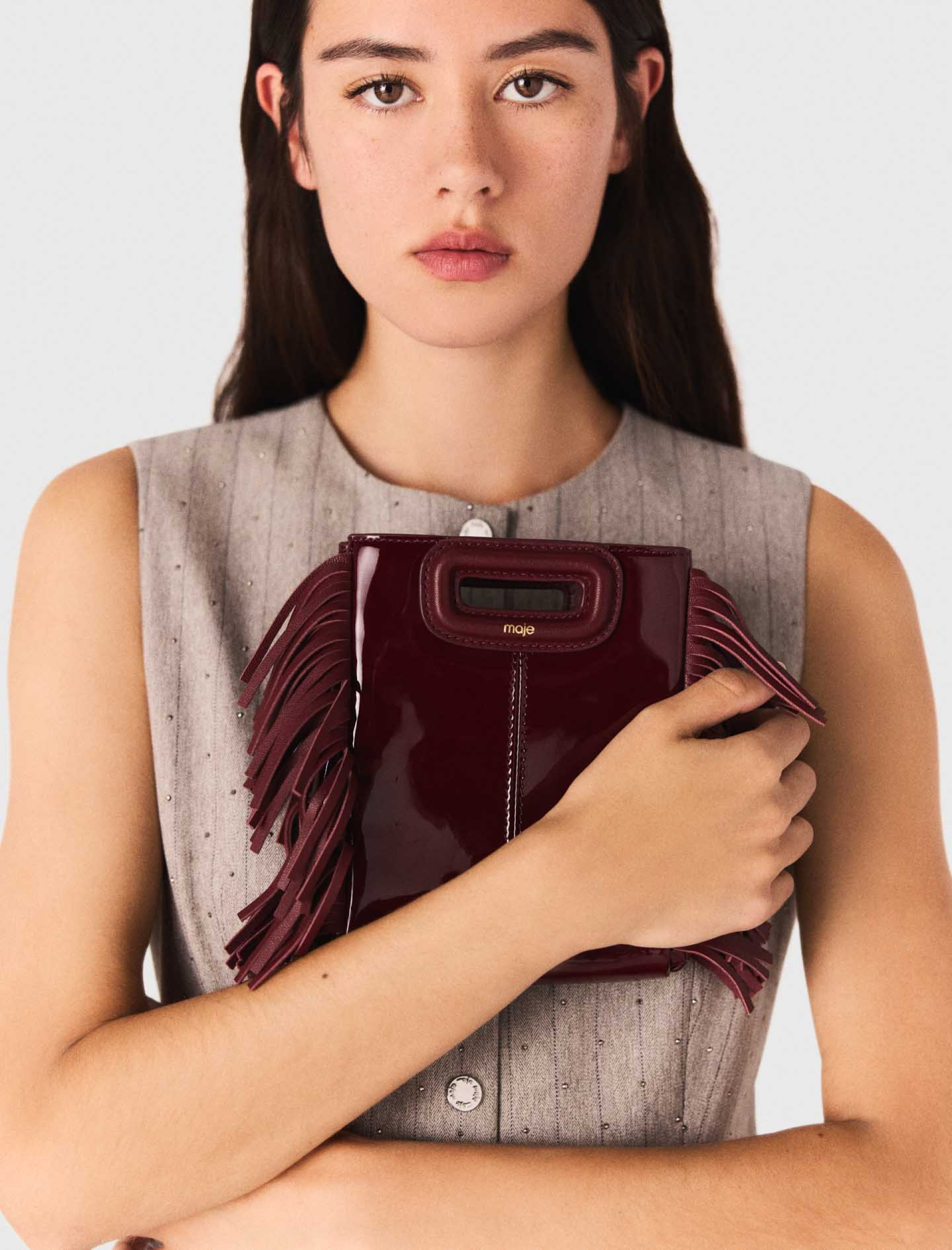 Жіноча сіра сукня строгого крою зі стразами