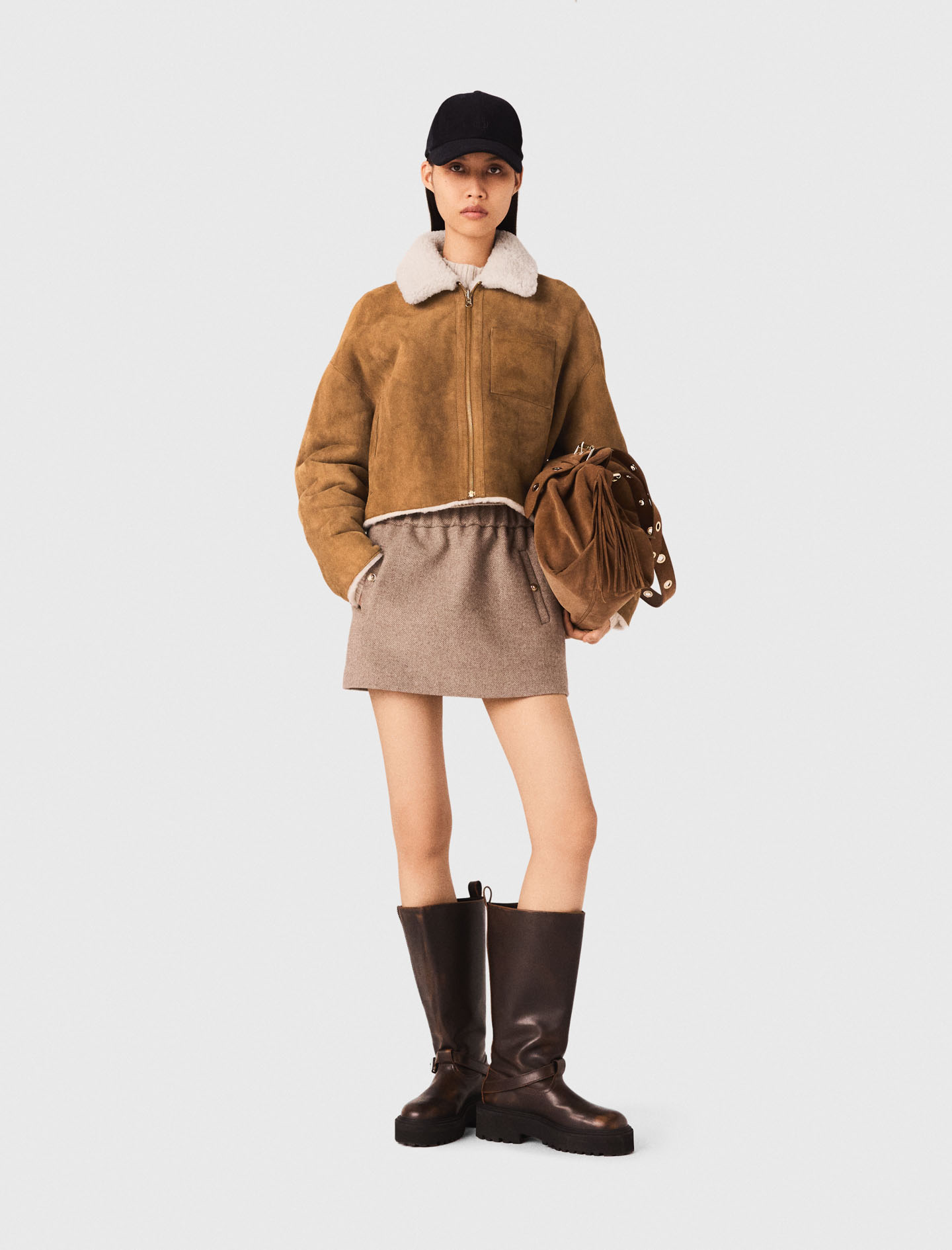 Жіноча коротка двостороння дублянка