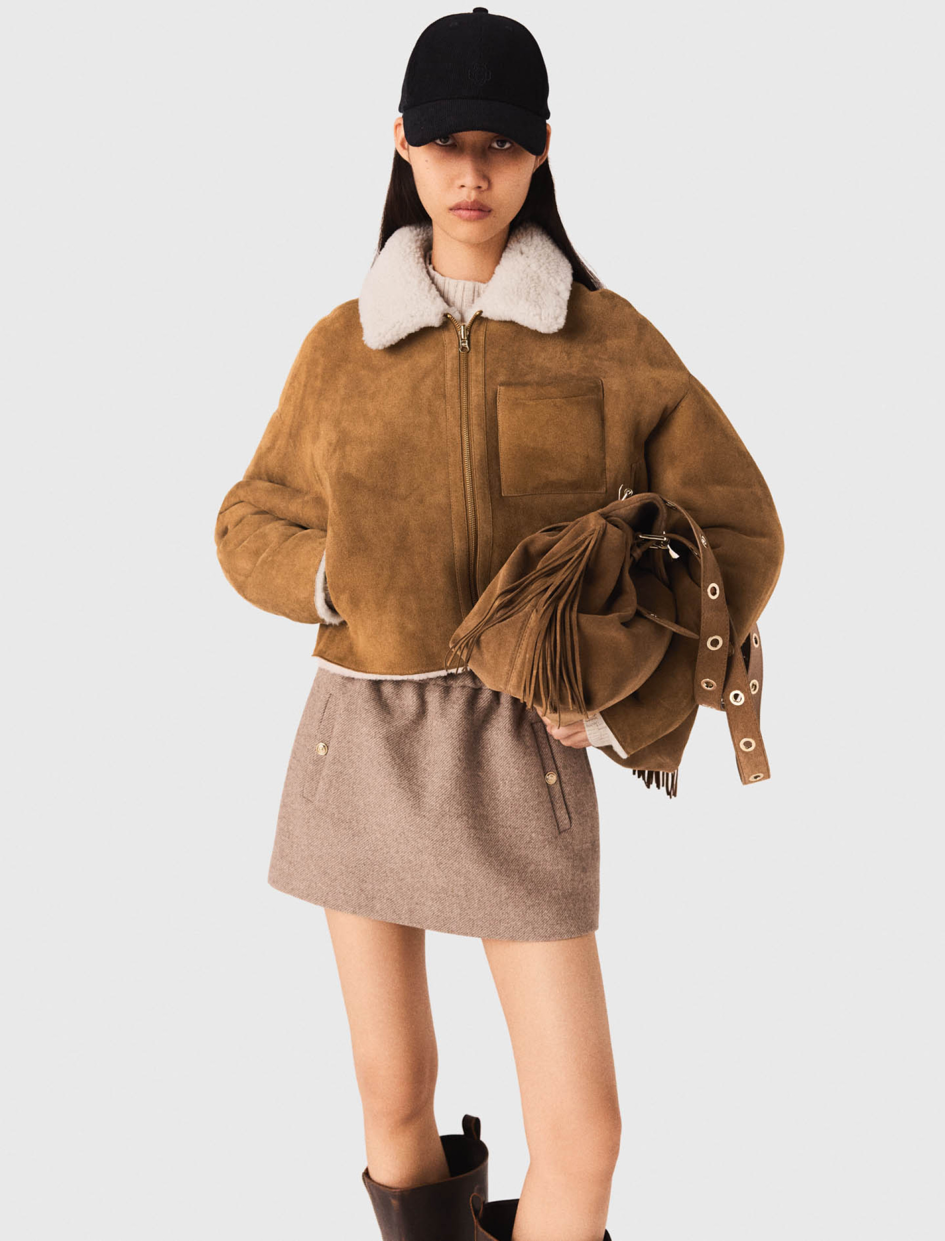 Жіноча коротка двостороння дублянка Жіноча коротка двостороння дублянка