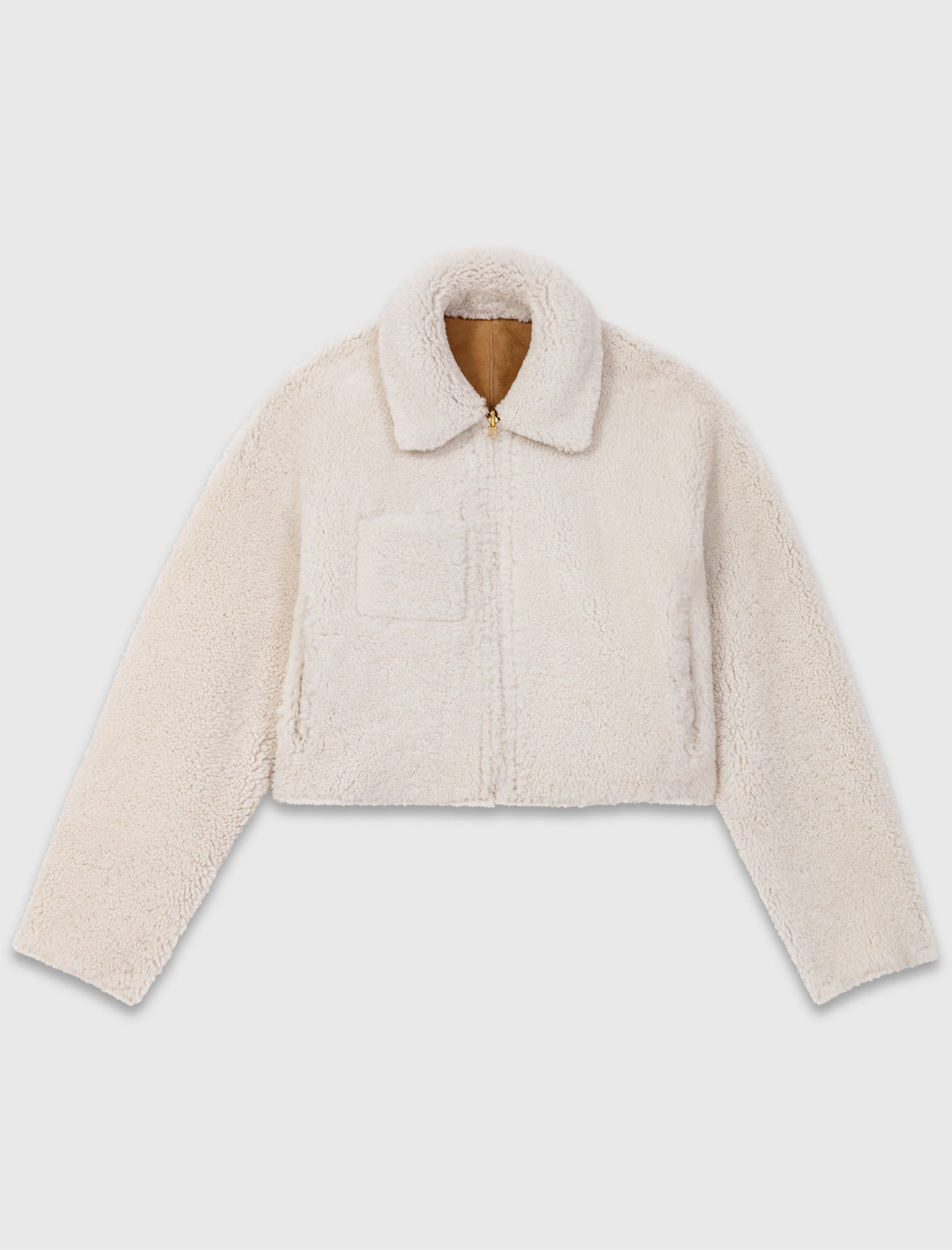 Жіноча коротка двостороння дублянка Жіноча коротка двостороння дублянка