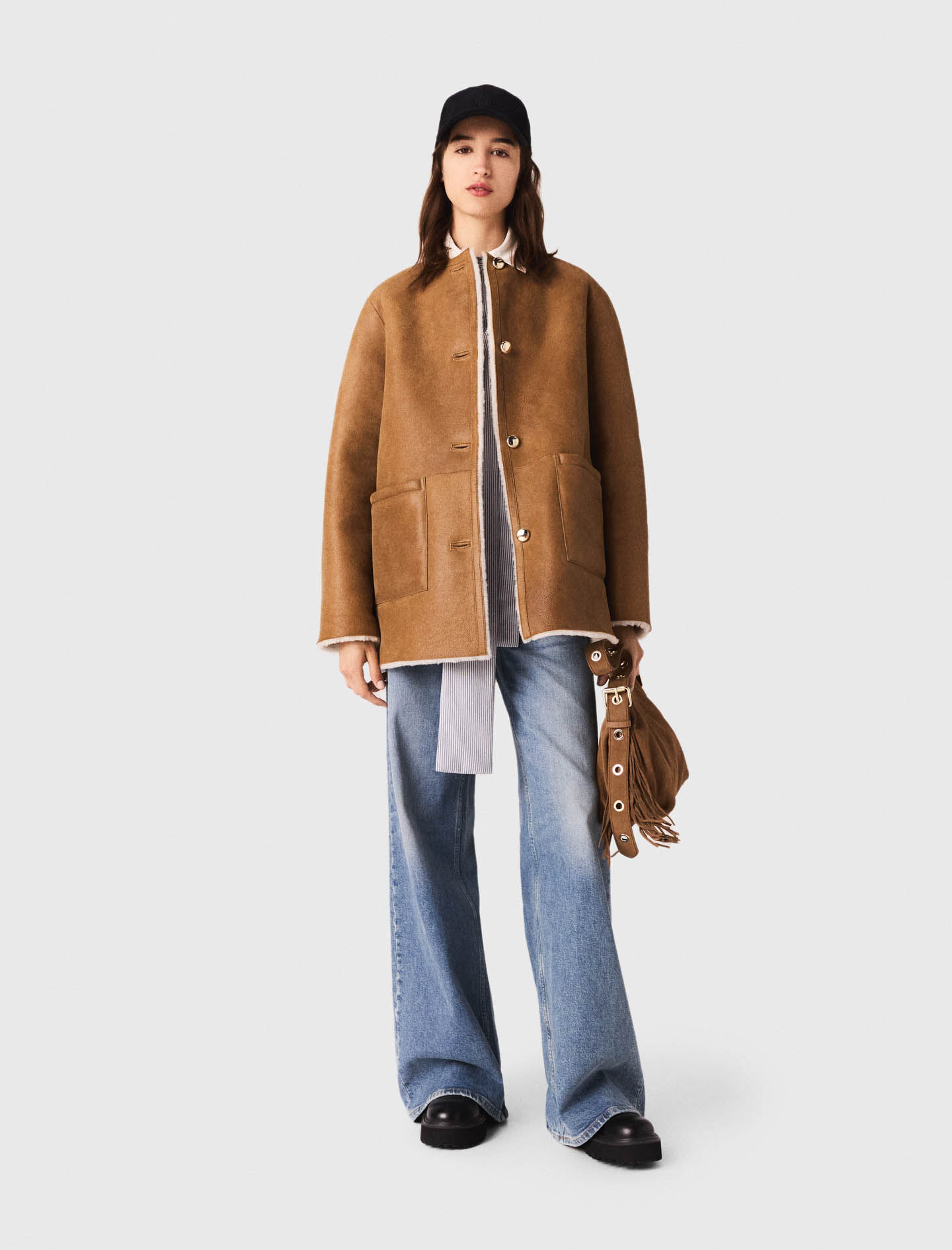 Жіноча довга двостороння дублянка