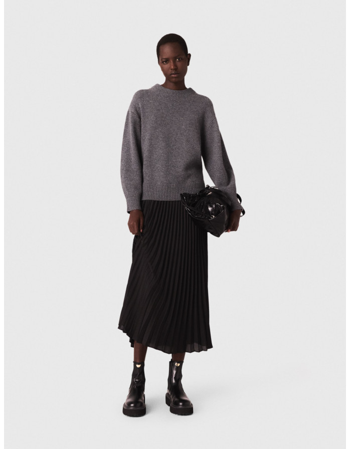 Жіноча сукня-светр з плісированою спідницею