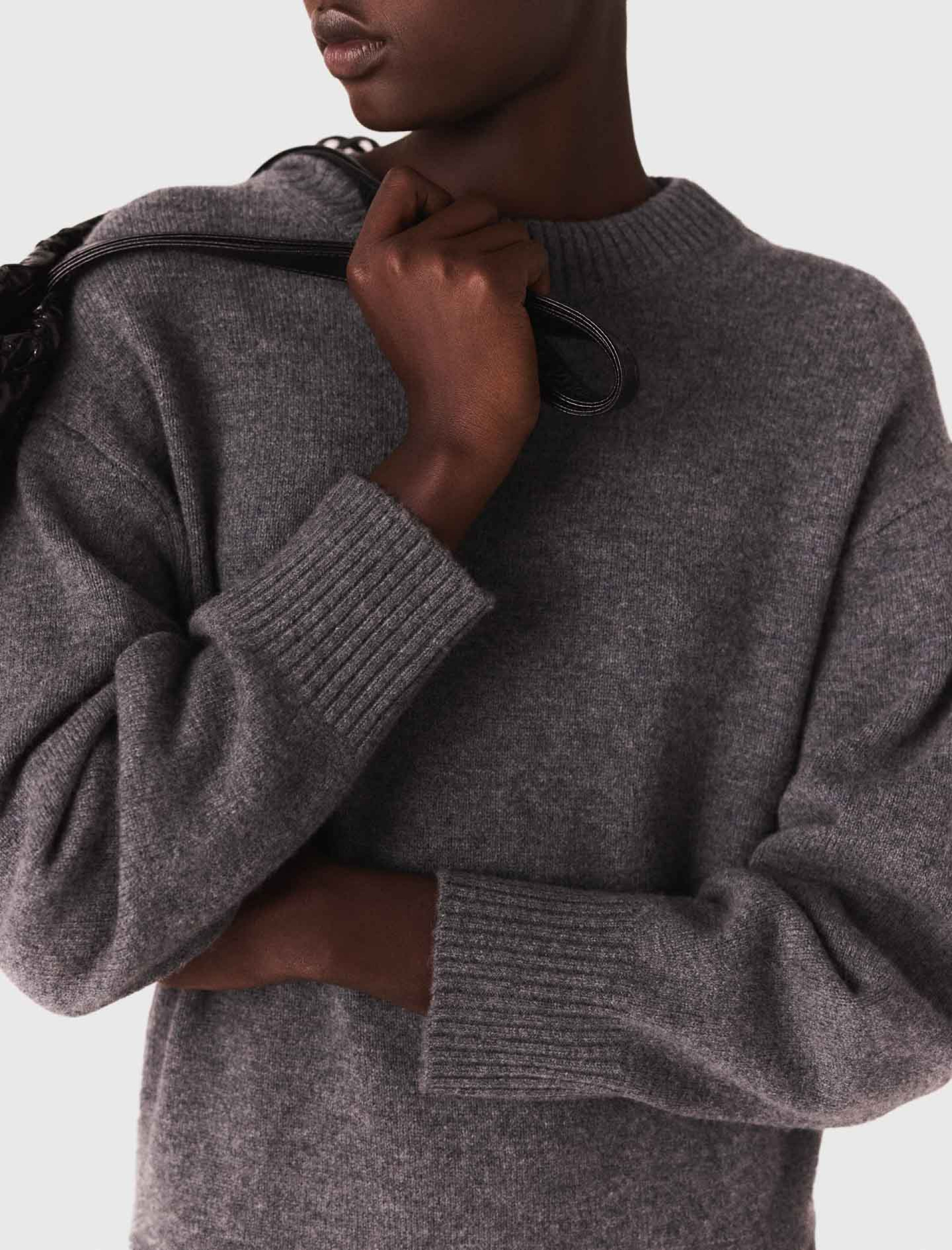 Жіноча сукня-светр з плісированою спідницею