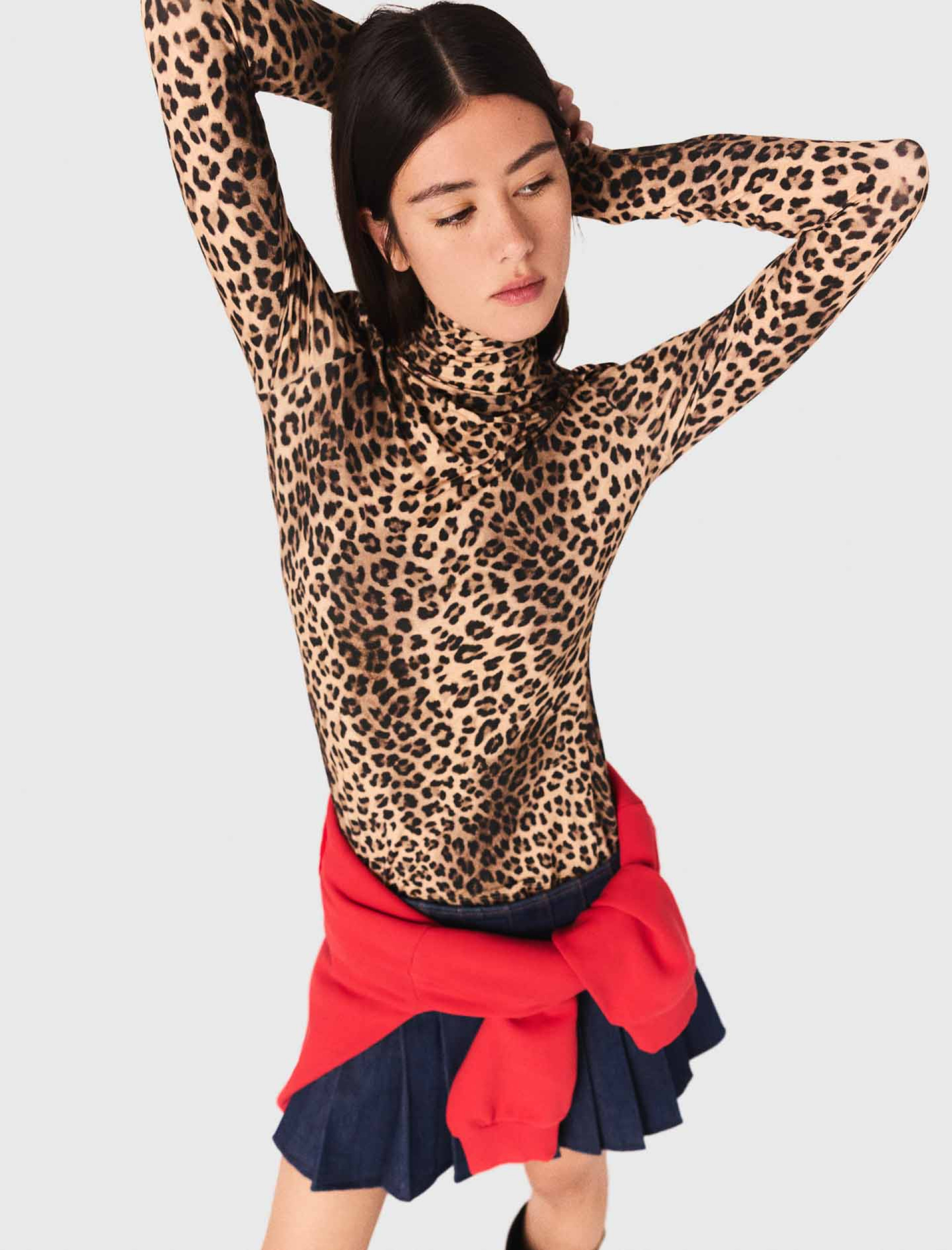 Жіночий гольф з леопардовим принтом