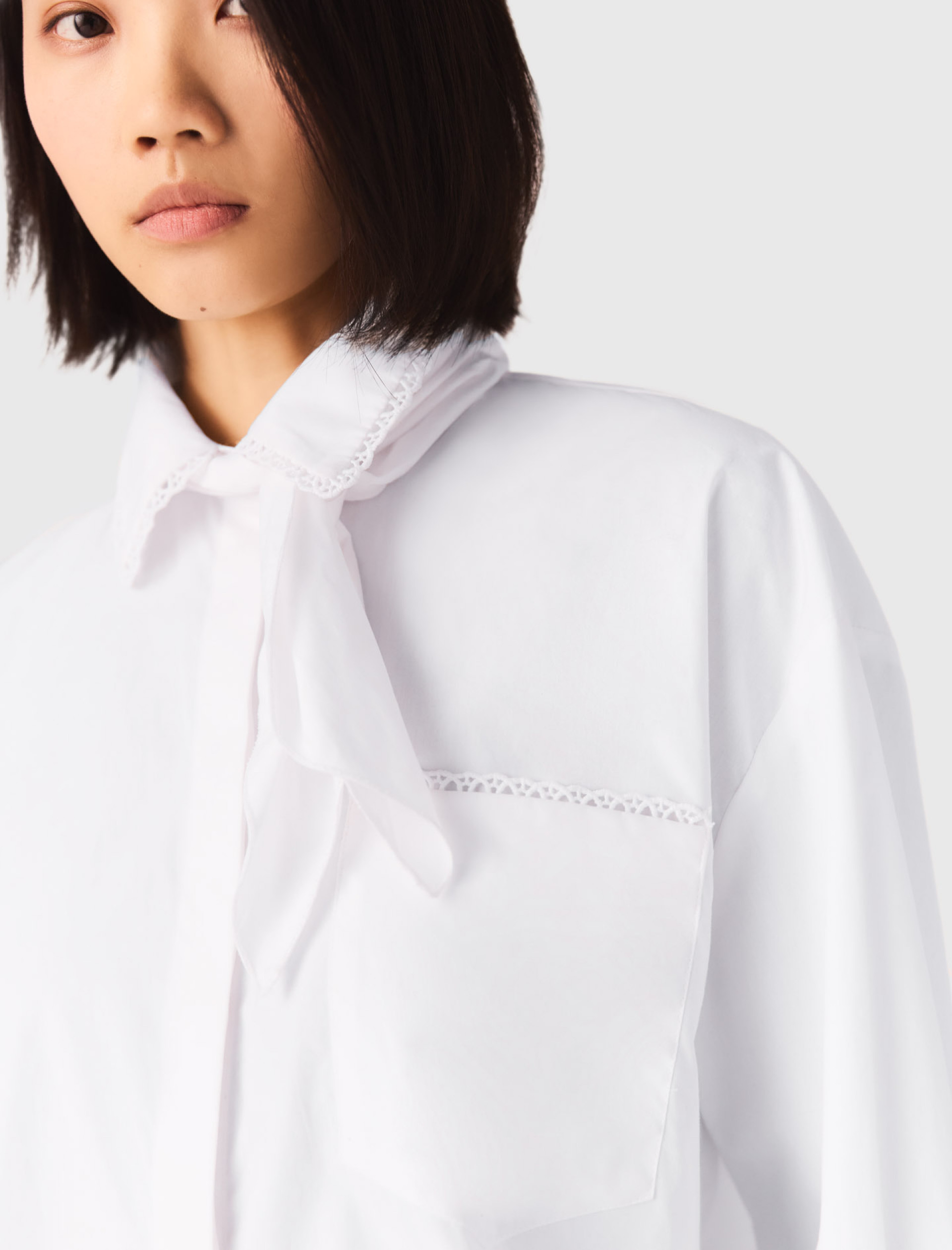 Женская рубашка с плетеной отделкой Женская рубашка с плетеной отделкой