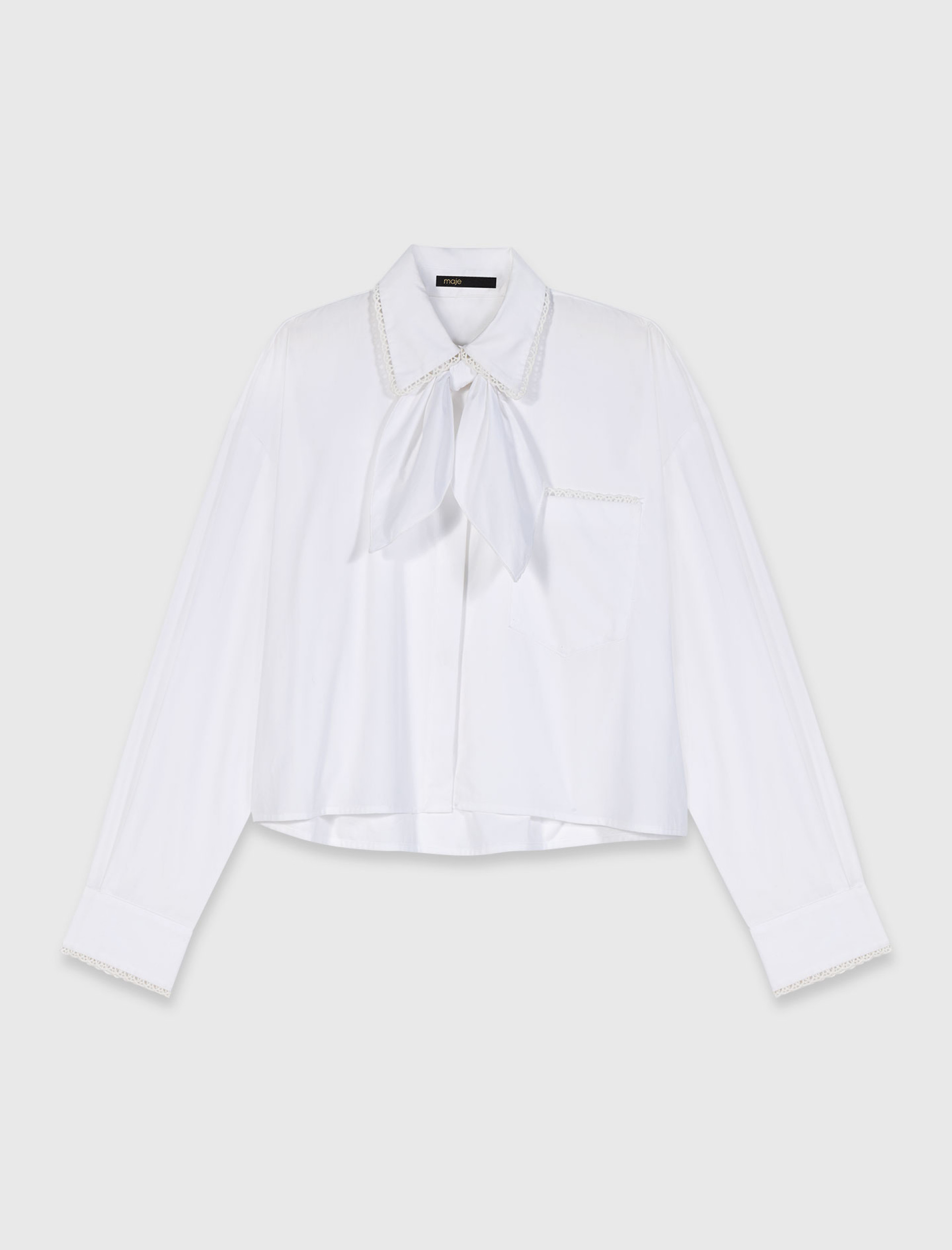 Женская рубашка с плетеной отделкой Женская рубашка с плетеной отделкой