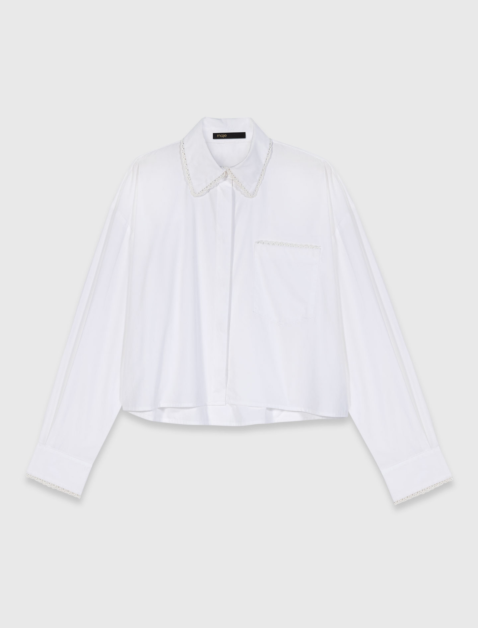 Женская рубашка с плетеной отделкой Женская рубашка с плетеной отделкой