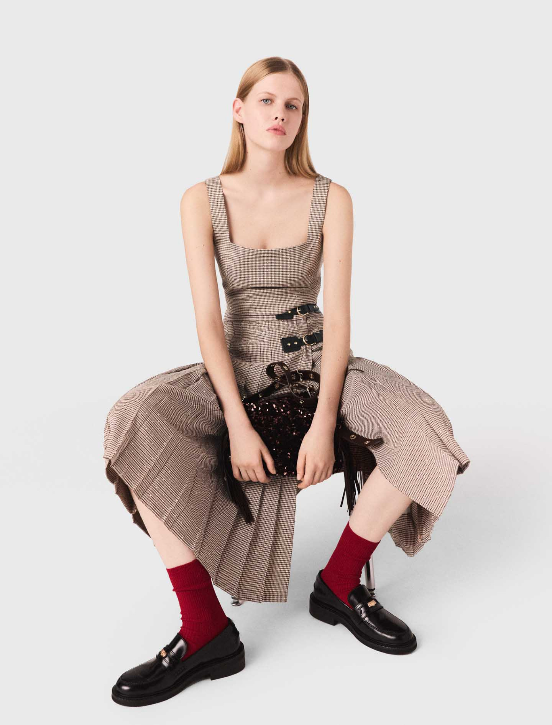 Женский топ с узором в гусиную лпаку