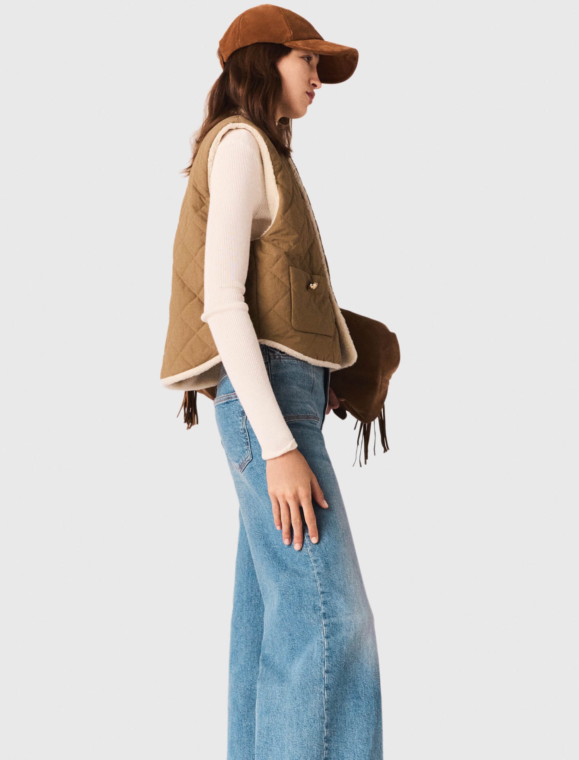 Жіночий двосторонній стьоганий жилет