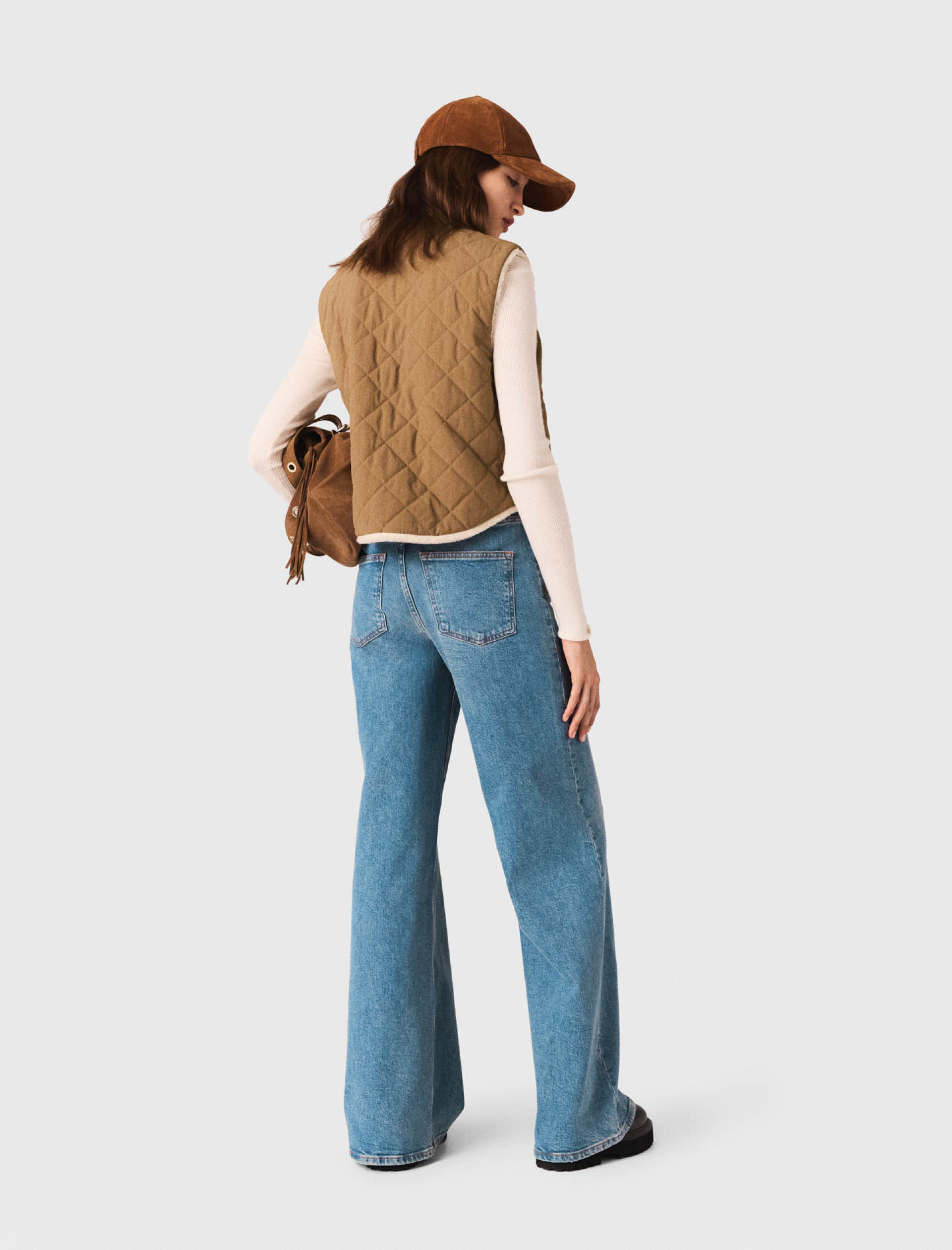 Жіночий двосторонній стьоганий жилет