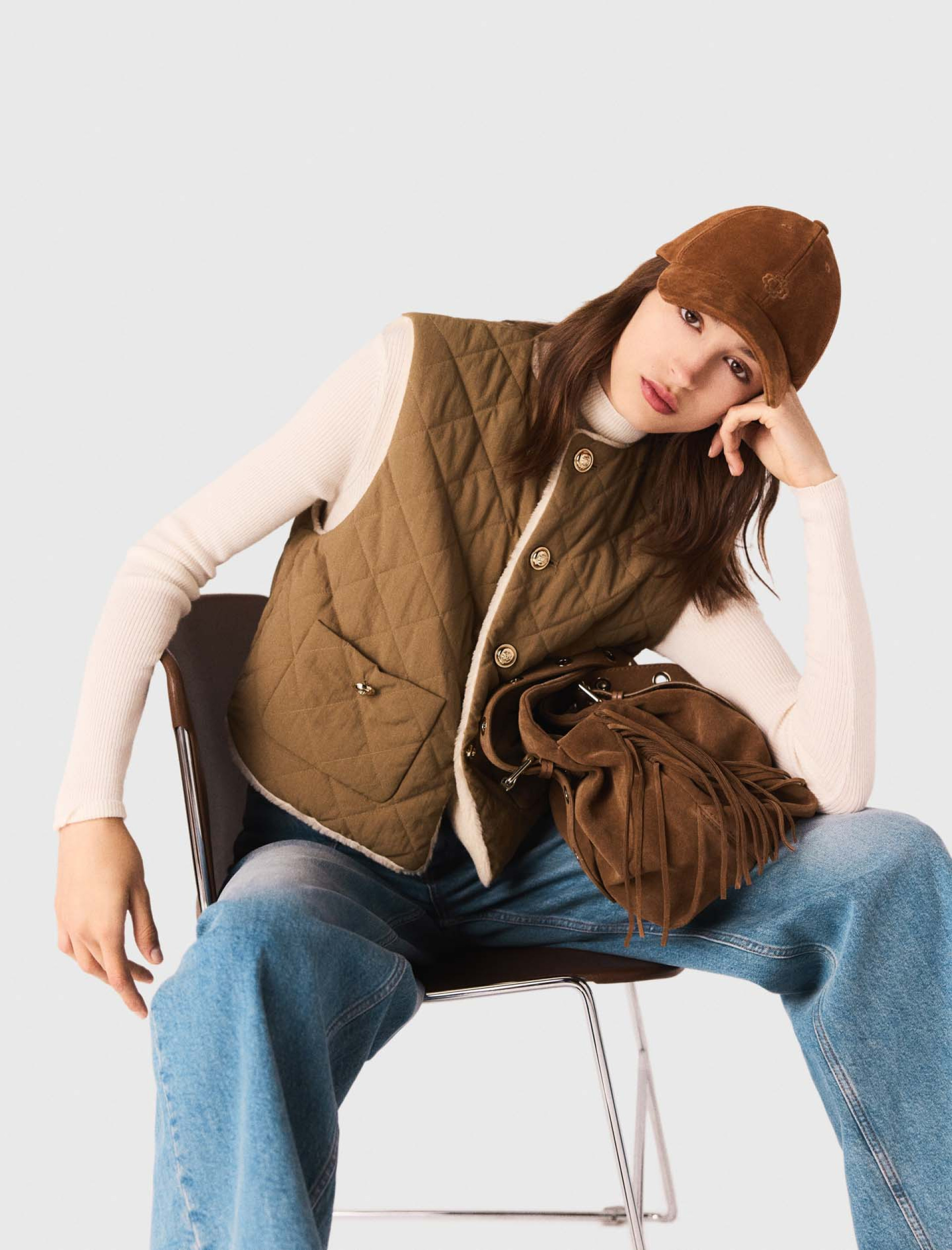 Жіночий двосторонній стьоганий жилет