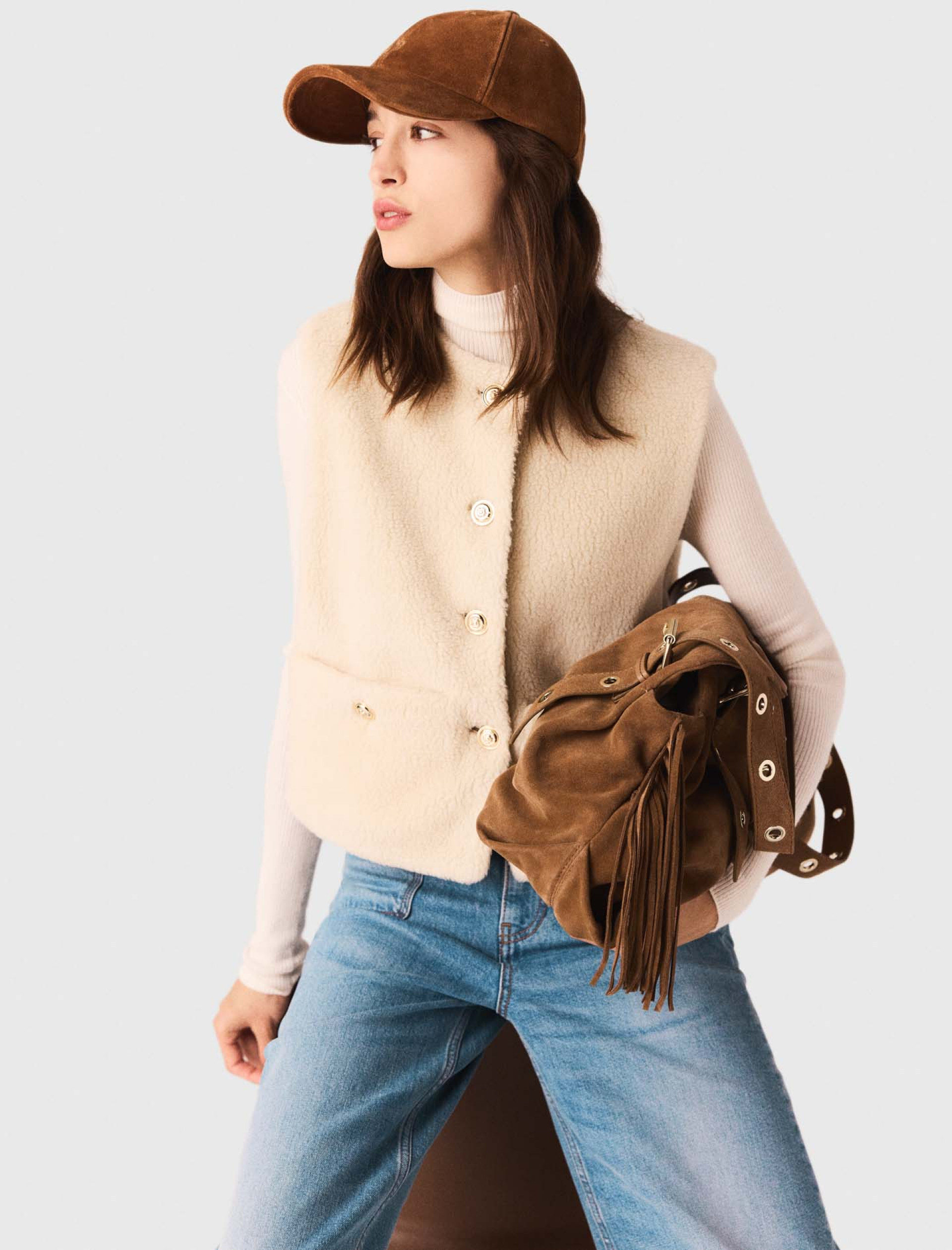 Жіночий двосторонній стьоганий жилет