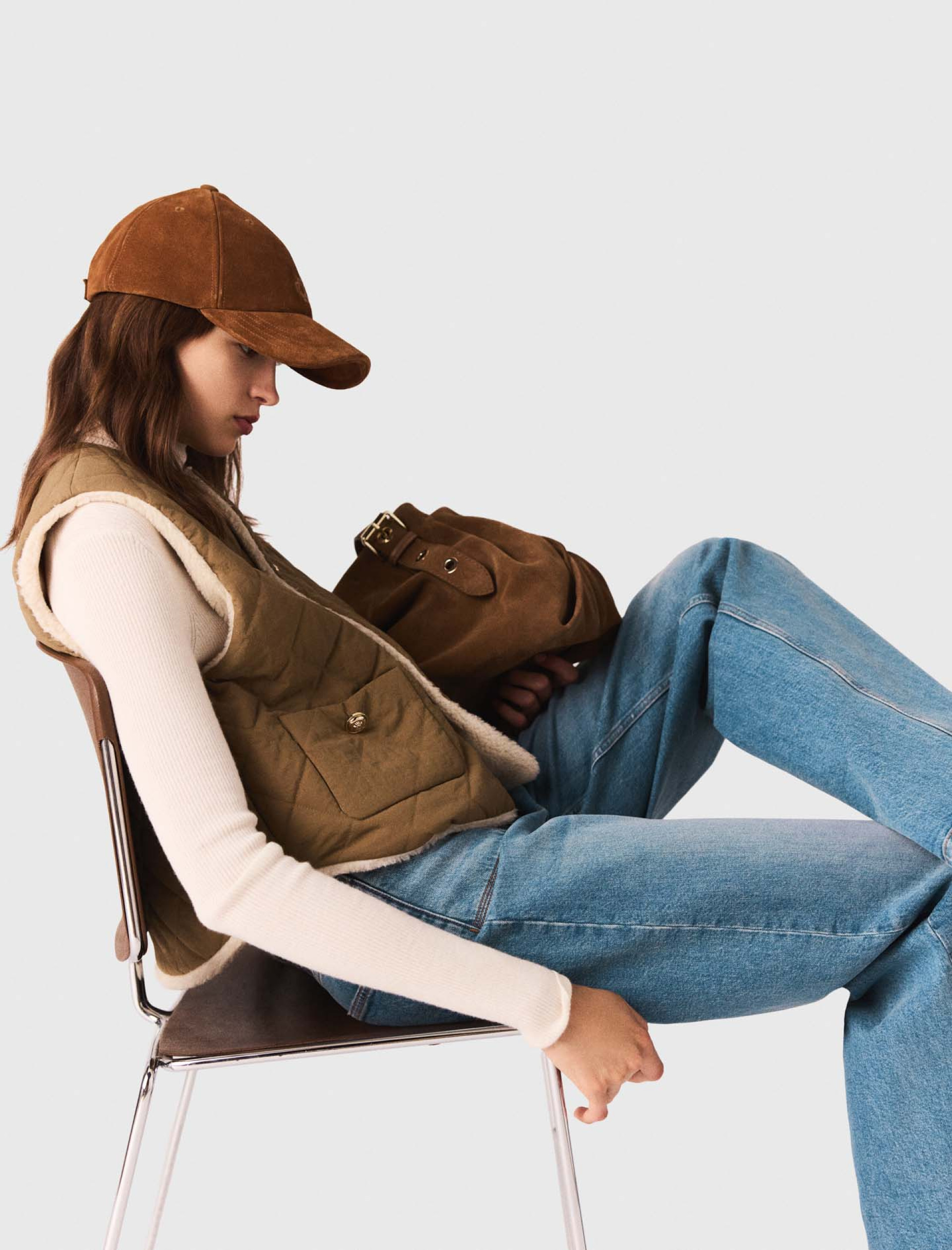 Жіночий двосторонній стьоганий жилет