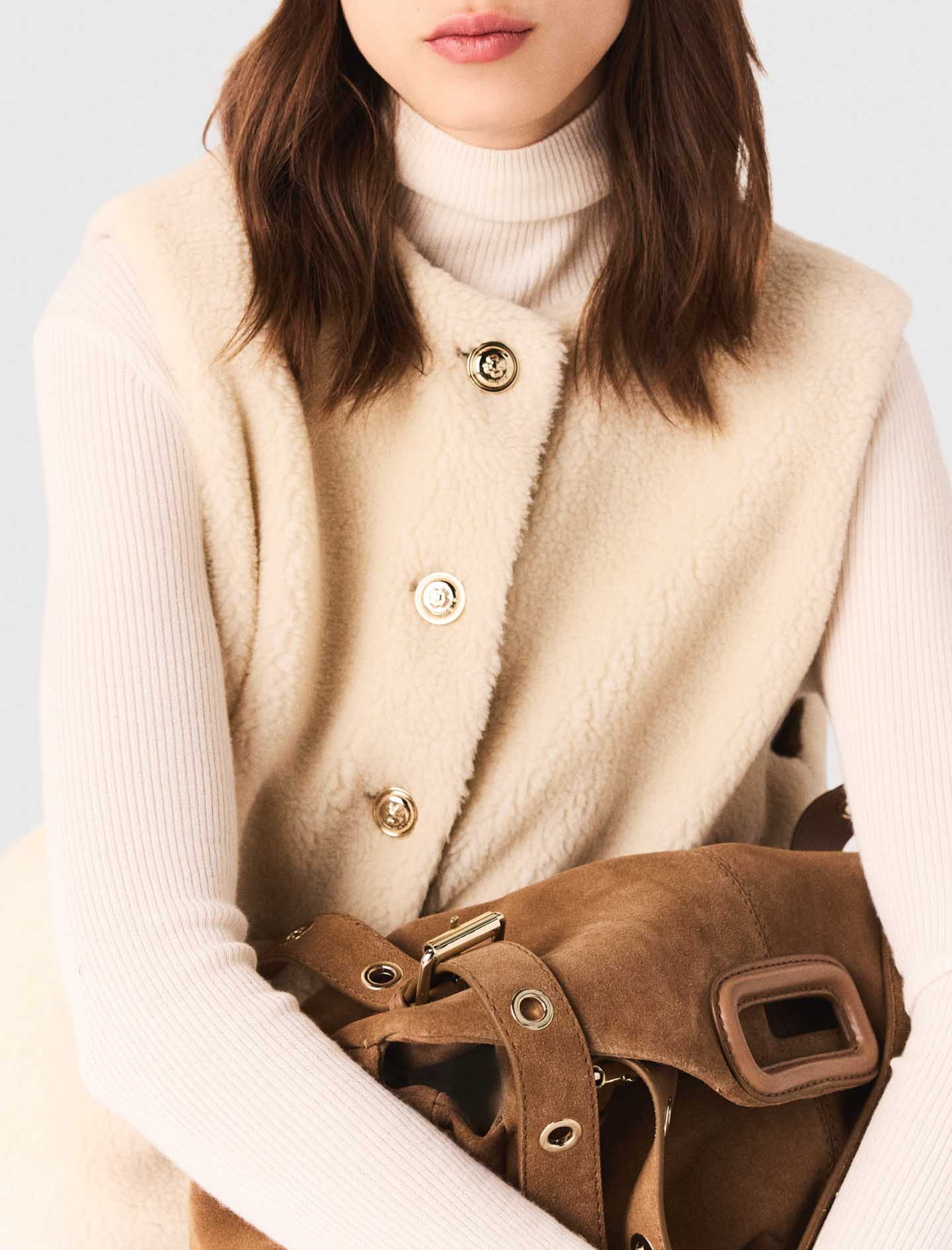 Жіночий двосторонній стьоганий жилет