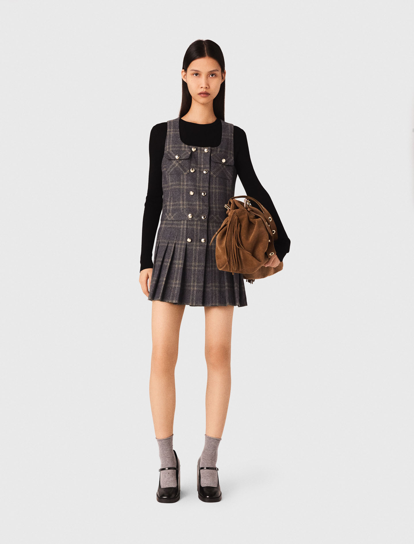 Жіноча коротка плісирована сукня в клітинку