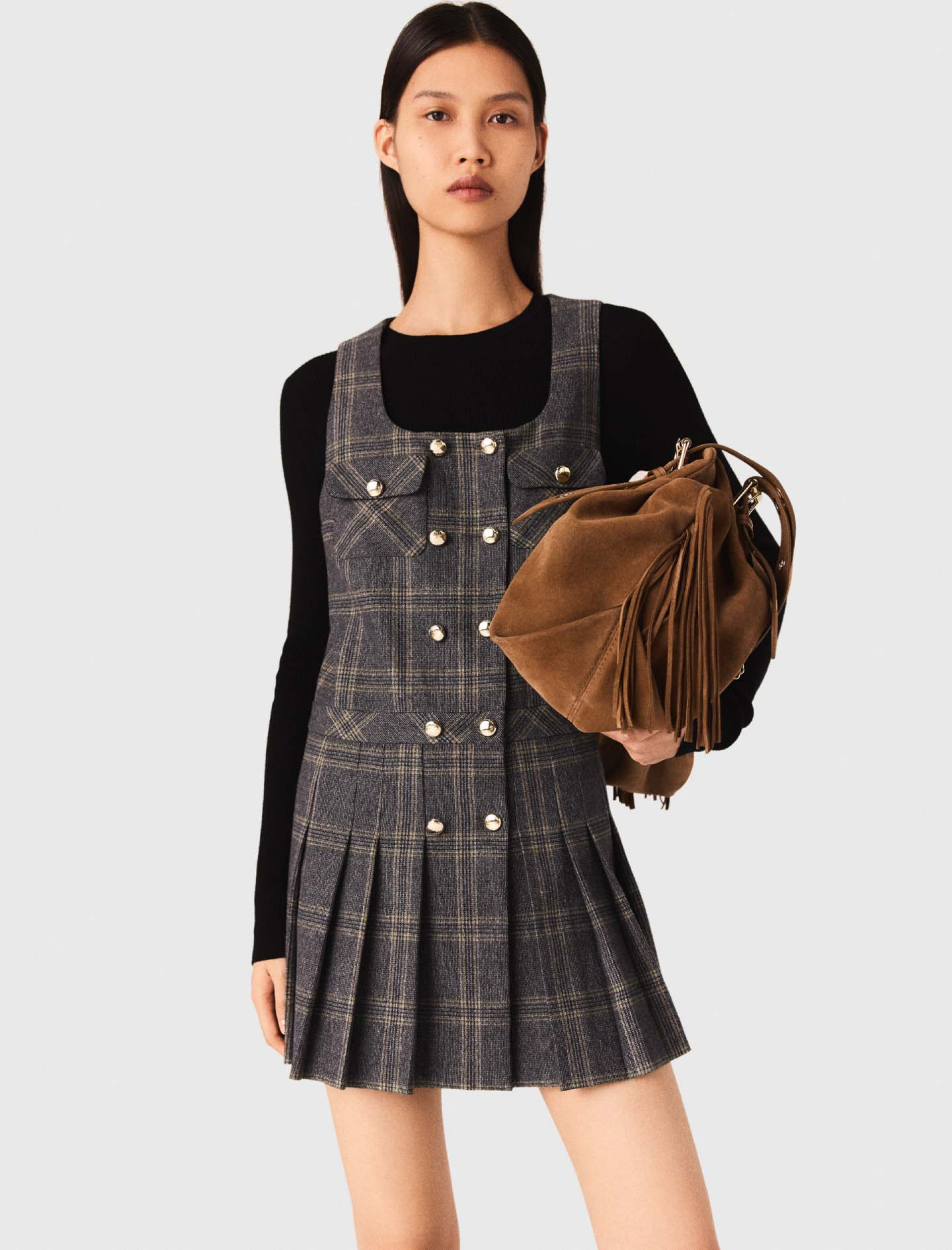 Жіноча коротка плісирована сукня в клітинку