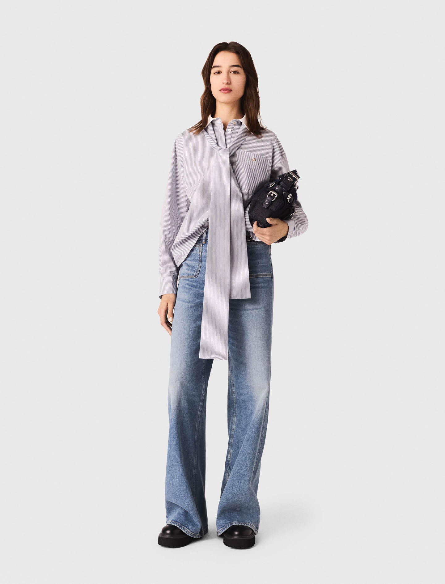 Женская полосатая рубашка с бантом