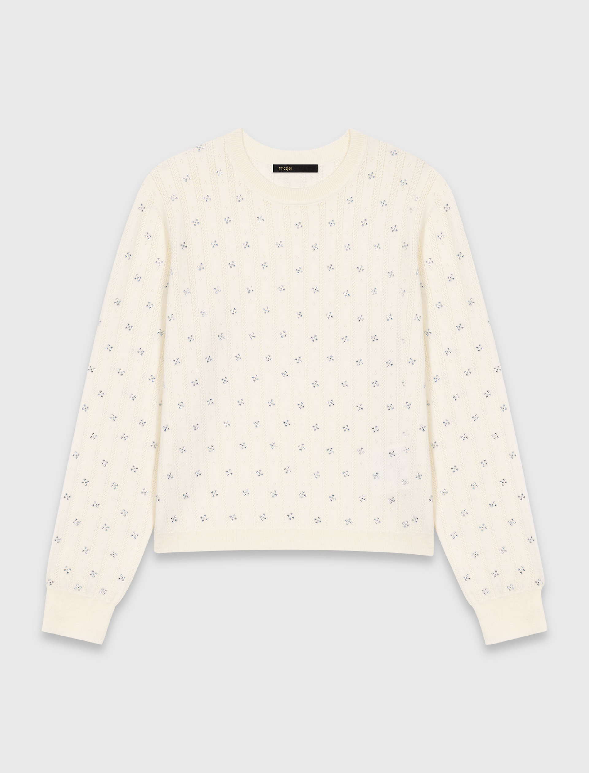 Женский молочный свитер со стразами