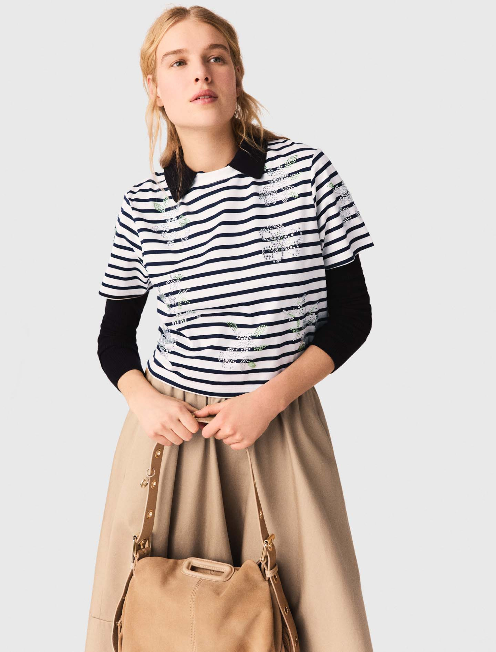 Жіноча смугаста футболка зі стразами Жіноча смугаста футболка зі стразами