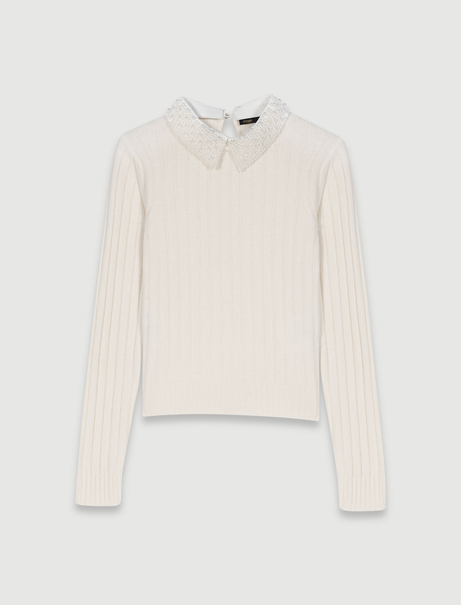 Жіночий молочний джемпер з декорованим коміром