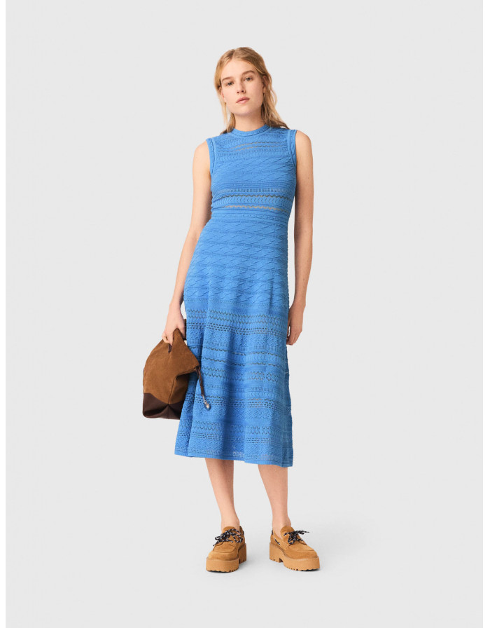 Жіноча в'язана сукня з ажурним візерунком