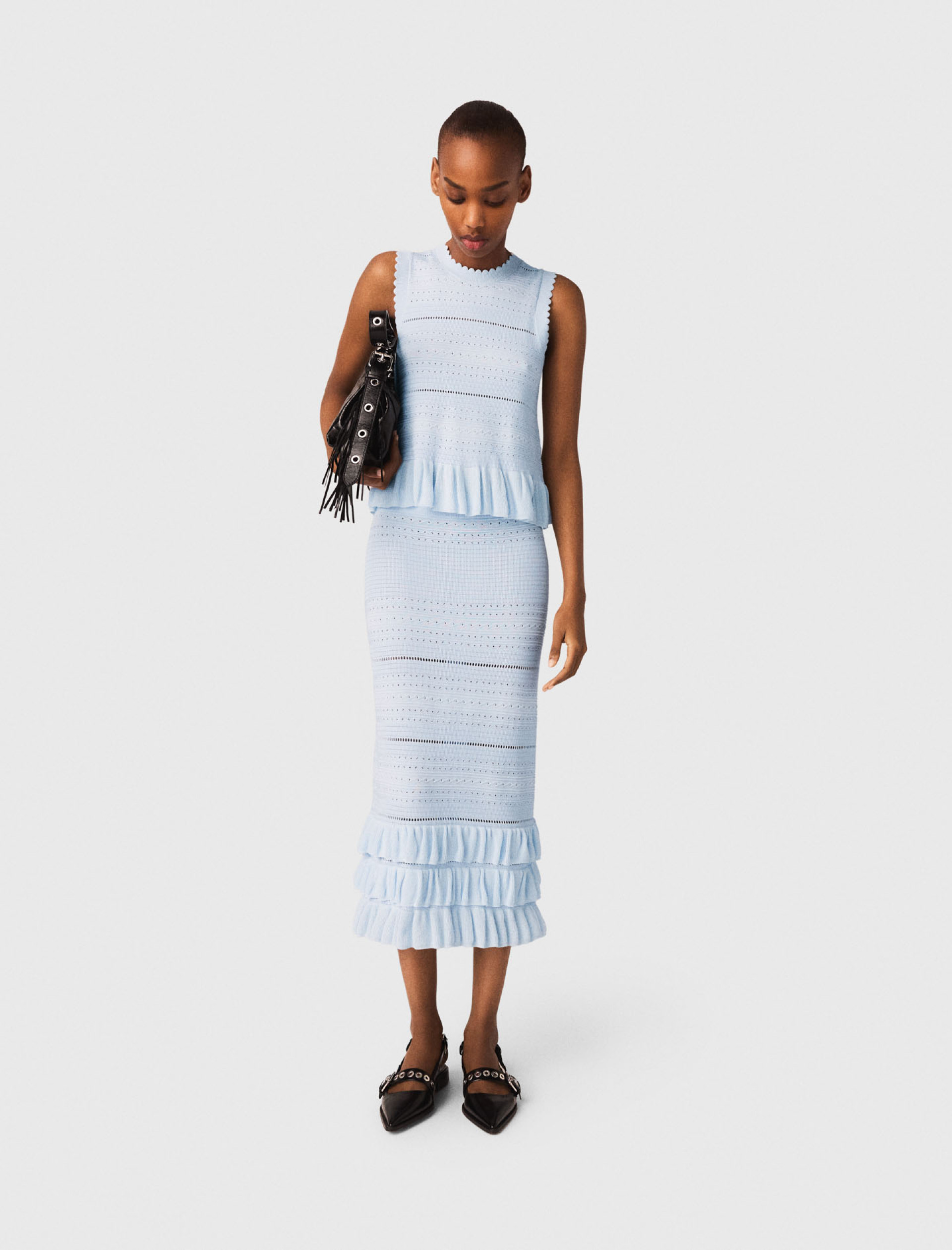 Женская вязаная юбка с оборками Женская вязаная юбка с оборками