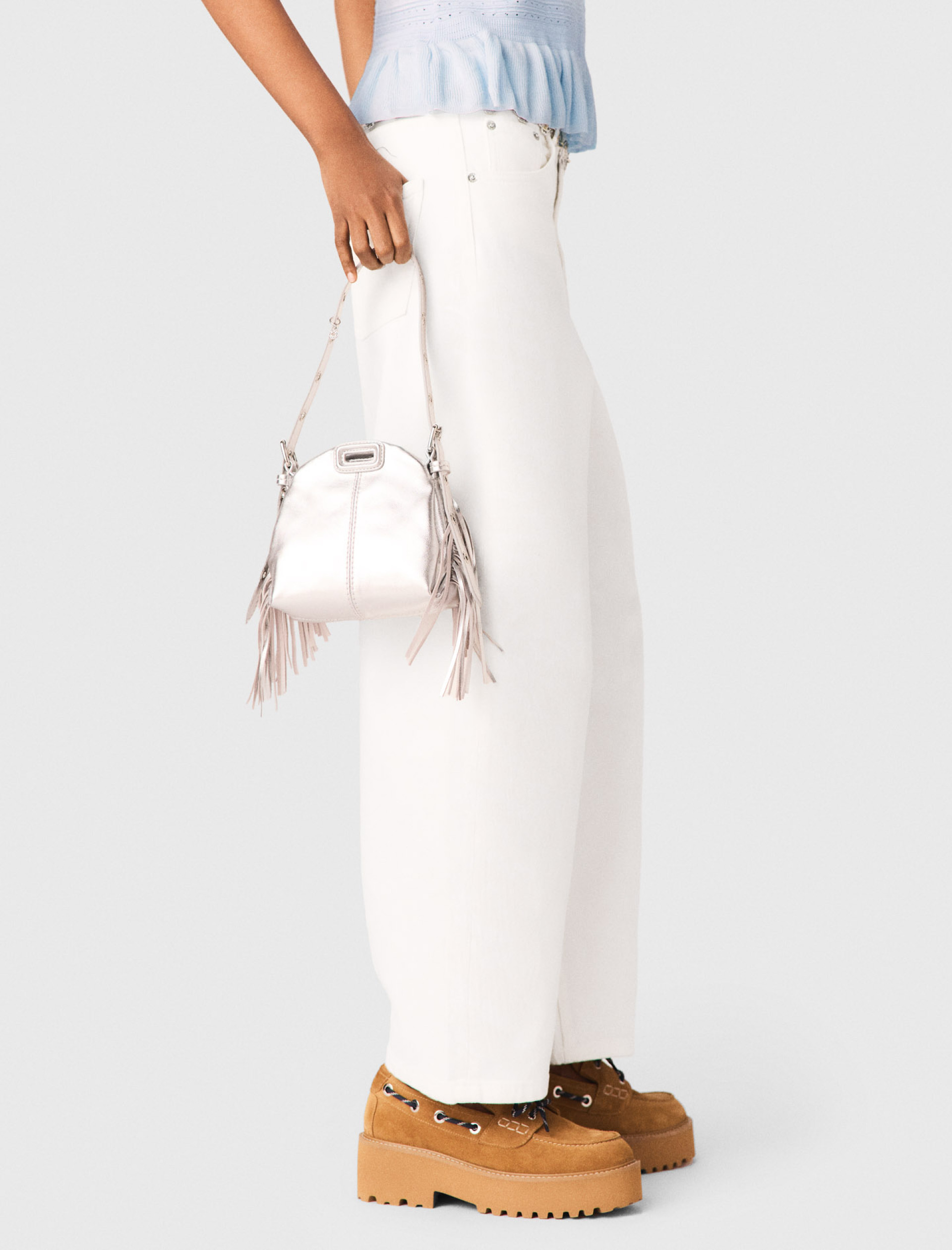 Женский голубой вязаный топ с оборками Женский голубой вязаный топ с оборками