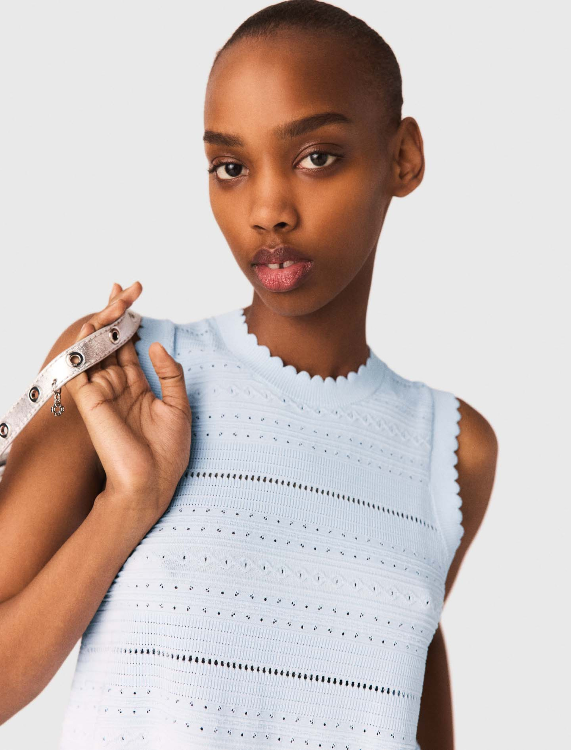 Женский голубой вязаный топ с оборками Женский голубой вязаный топ с оборками