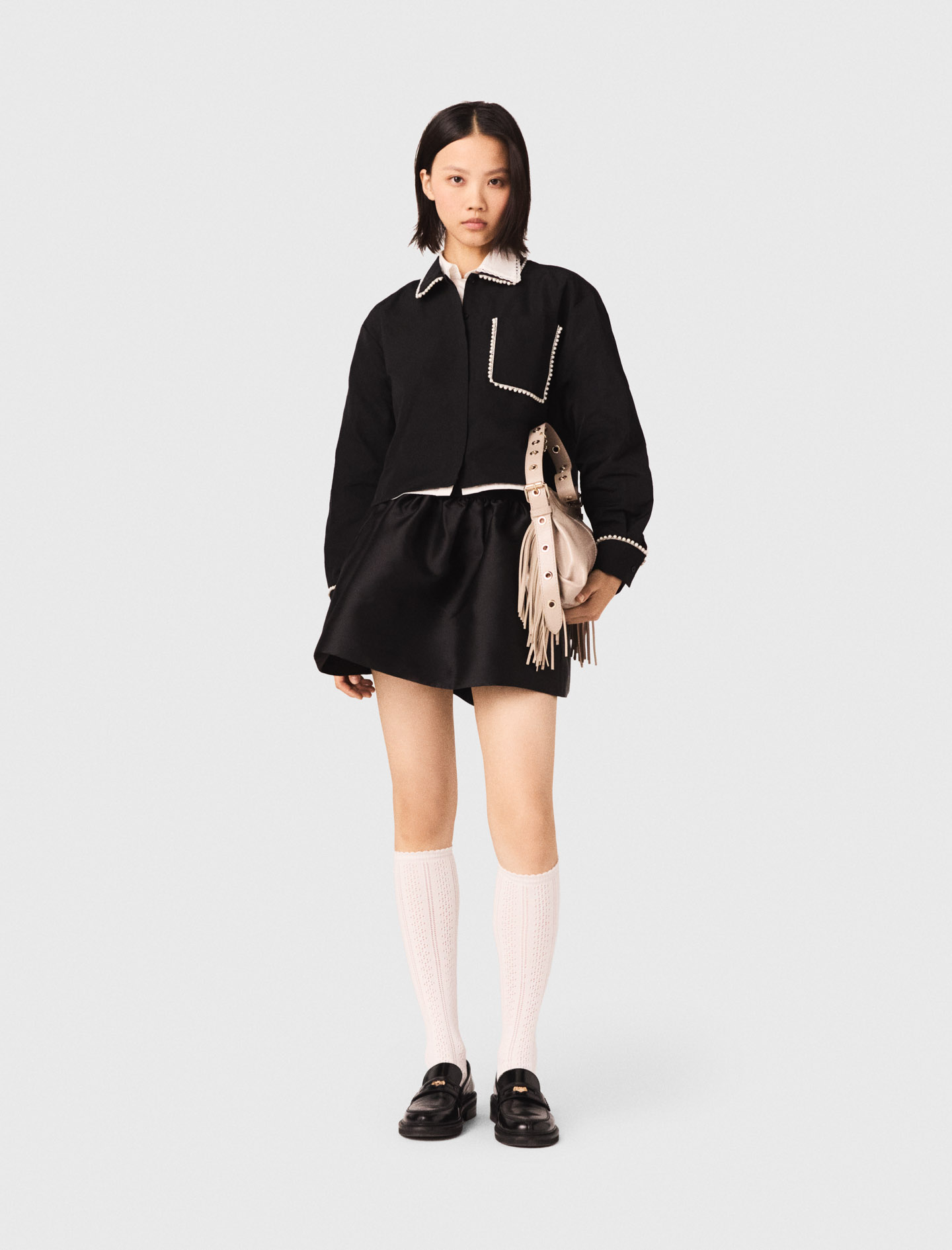 Жіноча чорна сорочка з плетеною обробкою