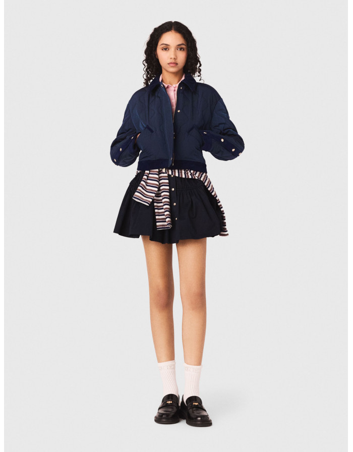 Жіноча стьобана куртка з оксамитовими деталями