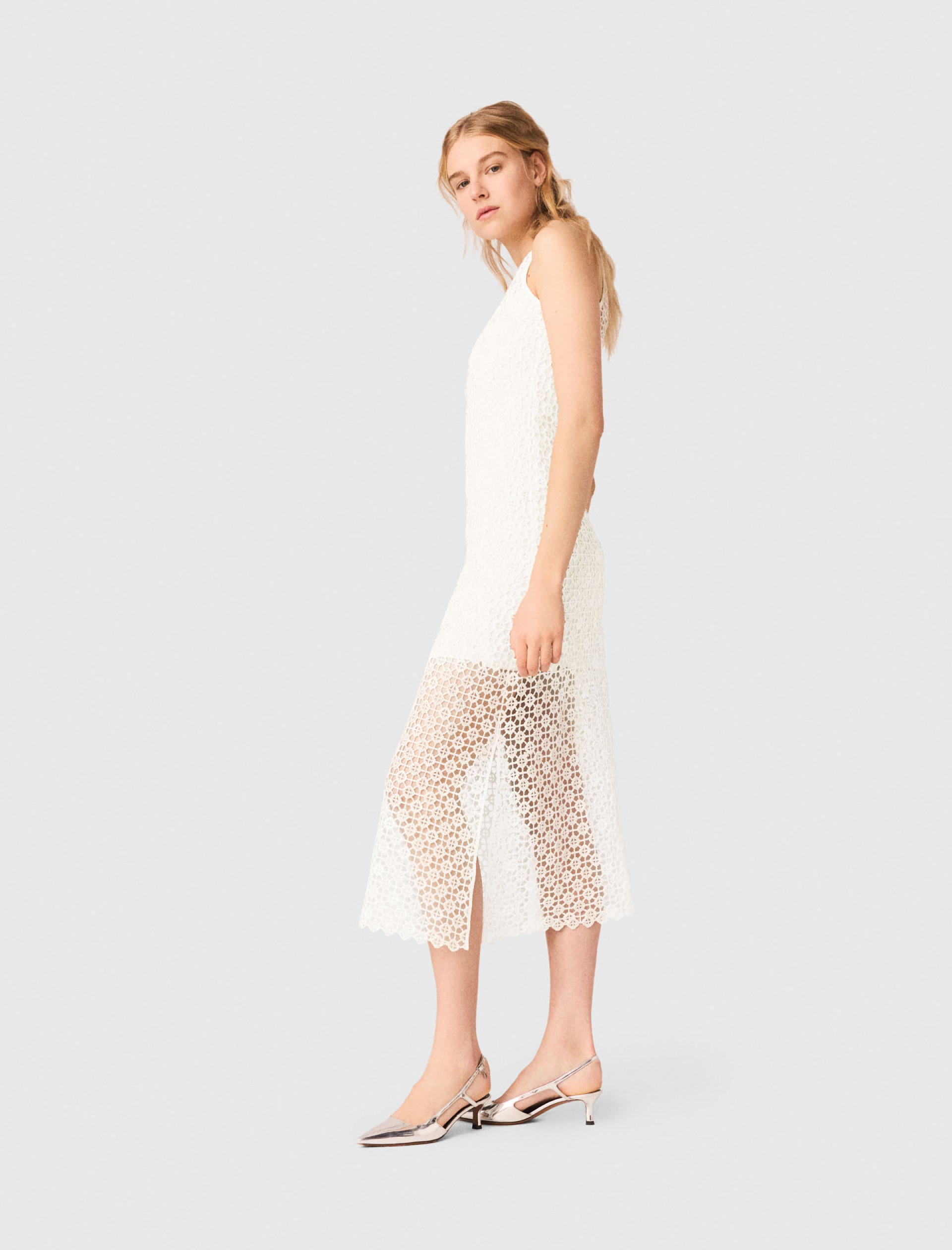 Жіноча довга в'язана сукня, прикрашена стразами Жіноча довга в'язана сукня, прикрашена стразами