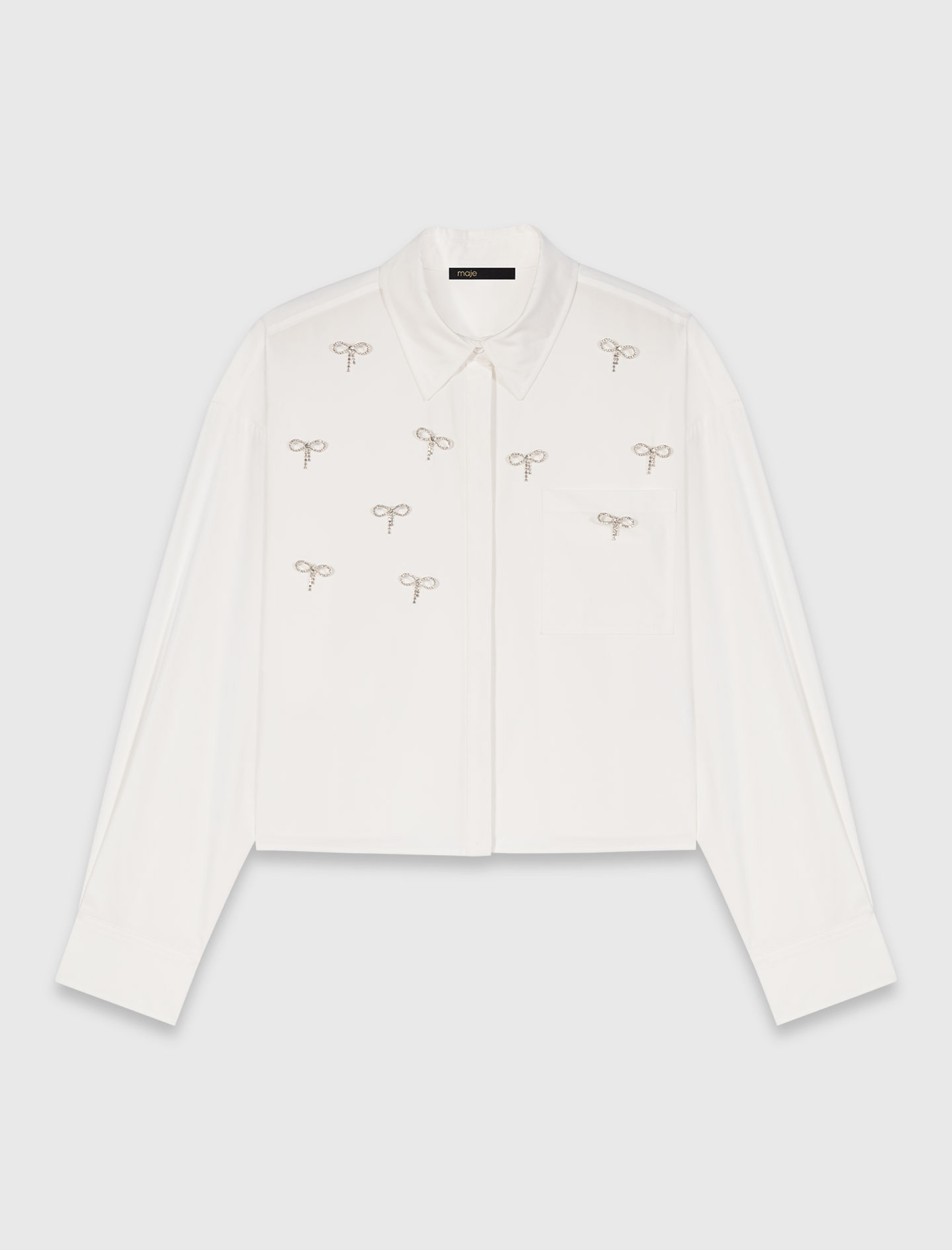 Жіноча сорочка з декоративними бантами зі стразами Жіноча сорочка з декоративними бантами зі стразами