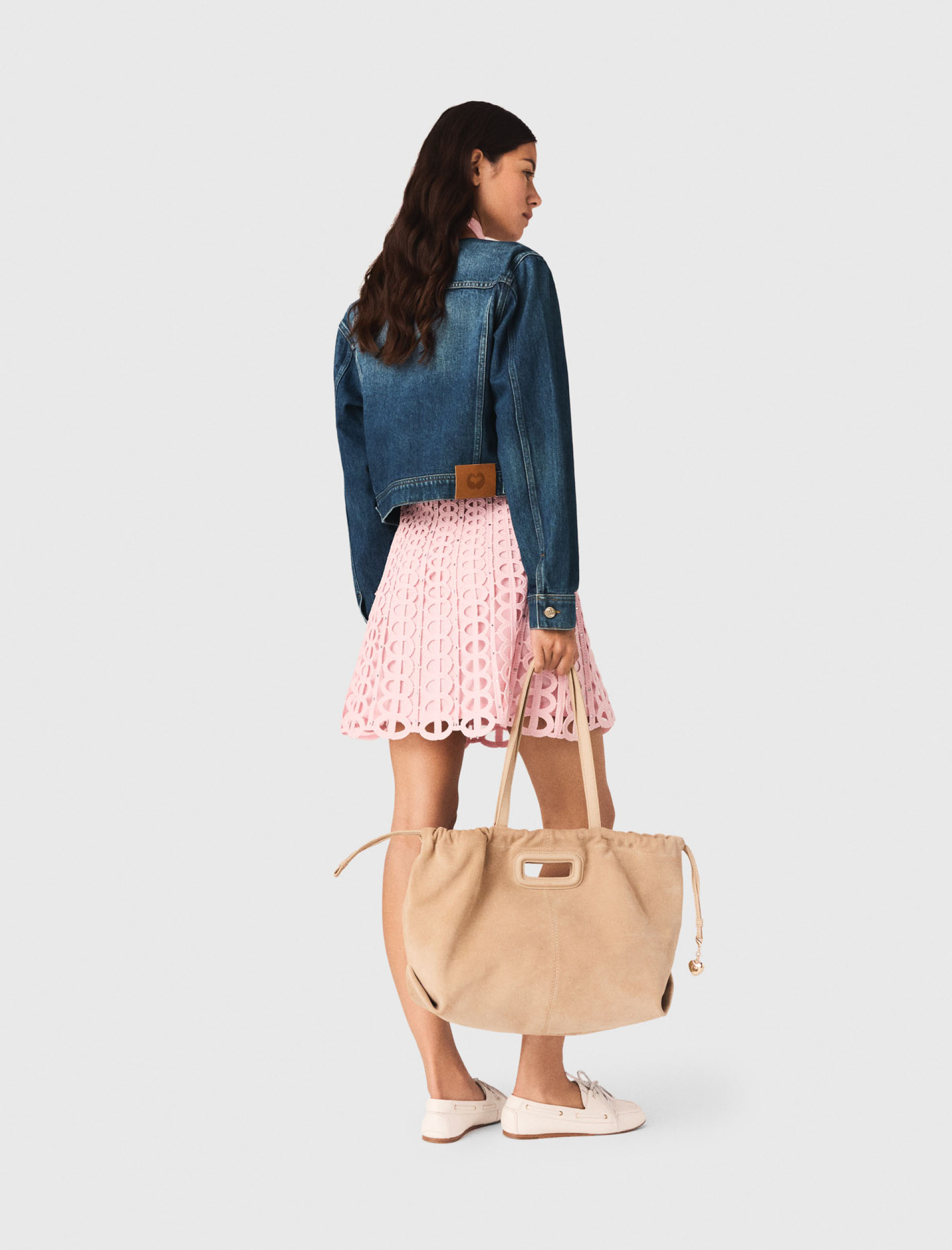 Жіноча джинсова куртка зі шкіряним коміром